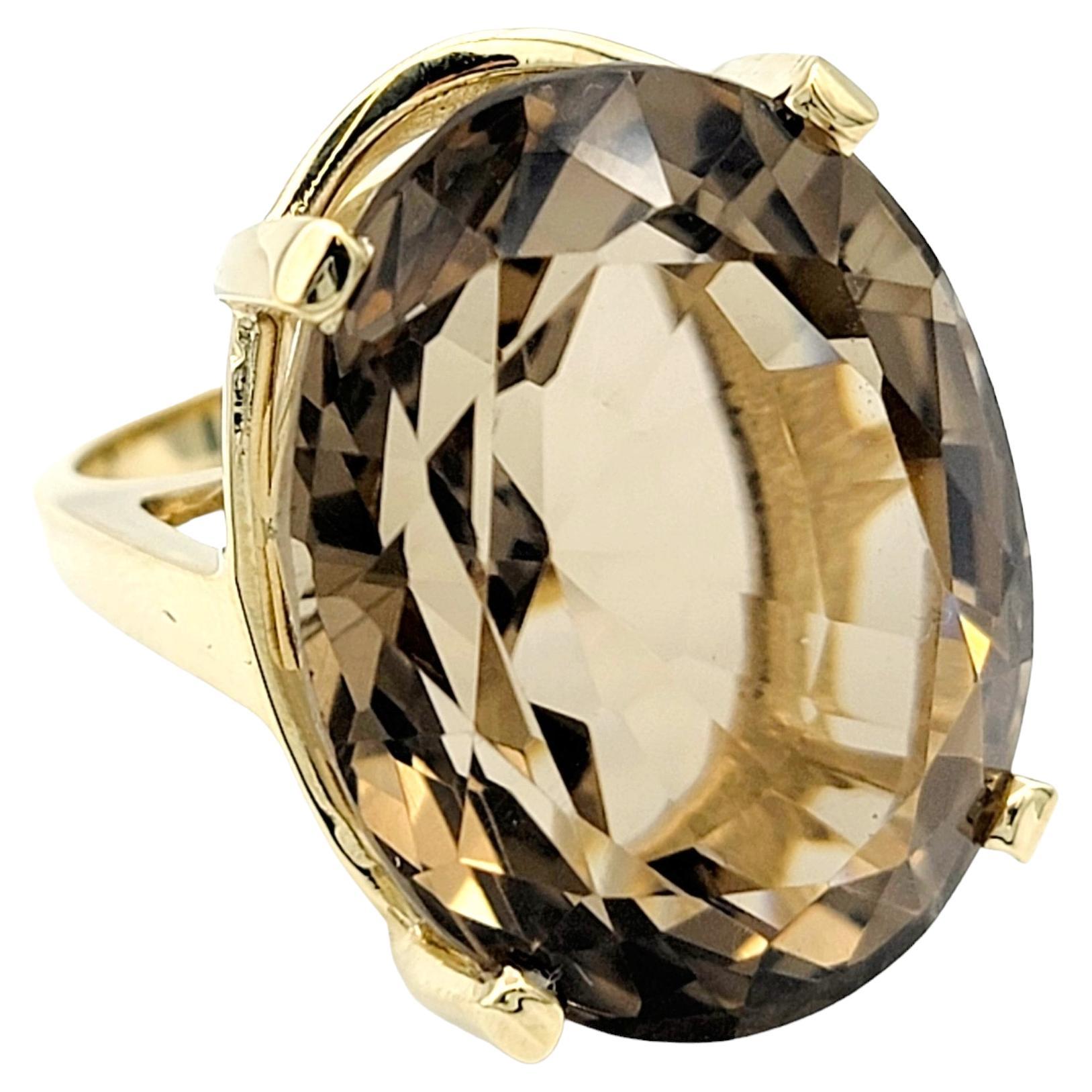 50.71 Carat Oval Cut Smoky Quartz Solitaire 14 Karat Yellow Gold Cocktail Ring For Sale