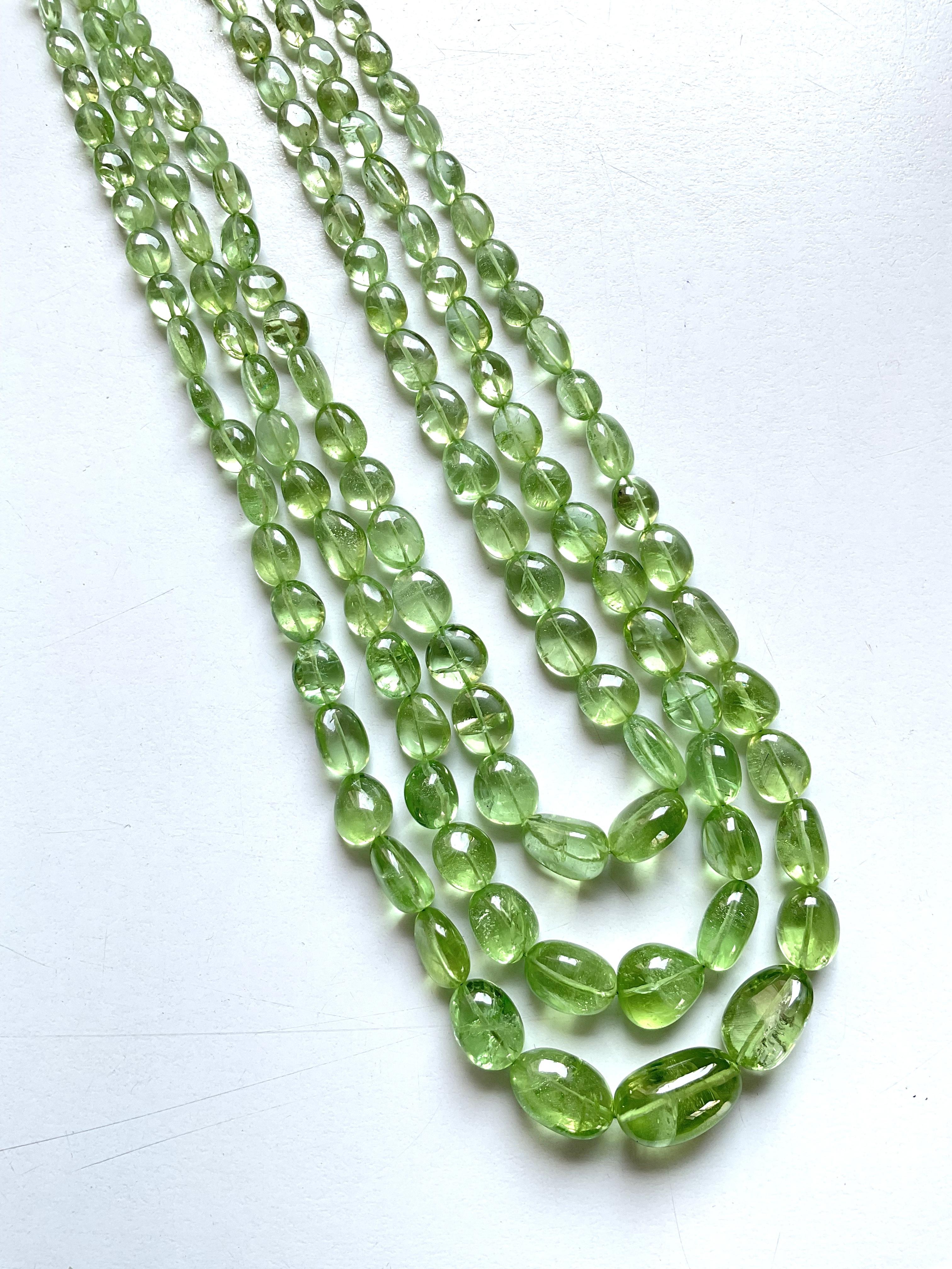 Tumbled 507.40 carats apple green peridot top quality plain tumbled natural necklace gem For Sale