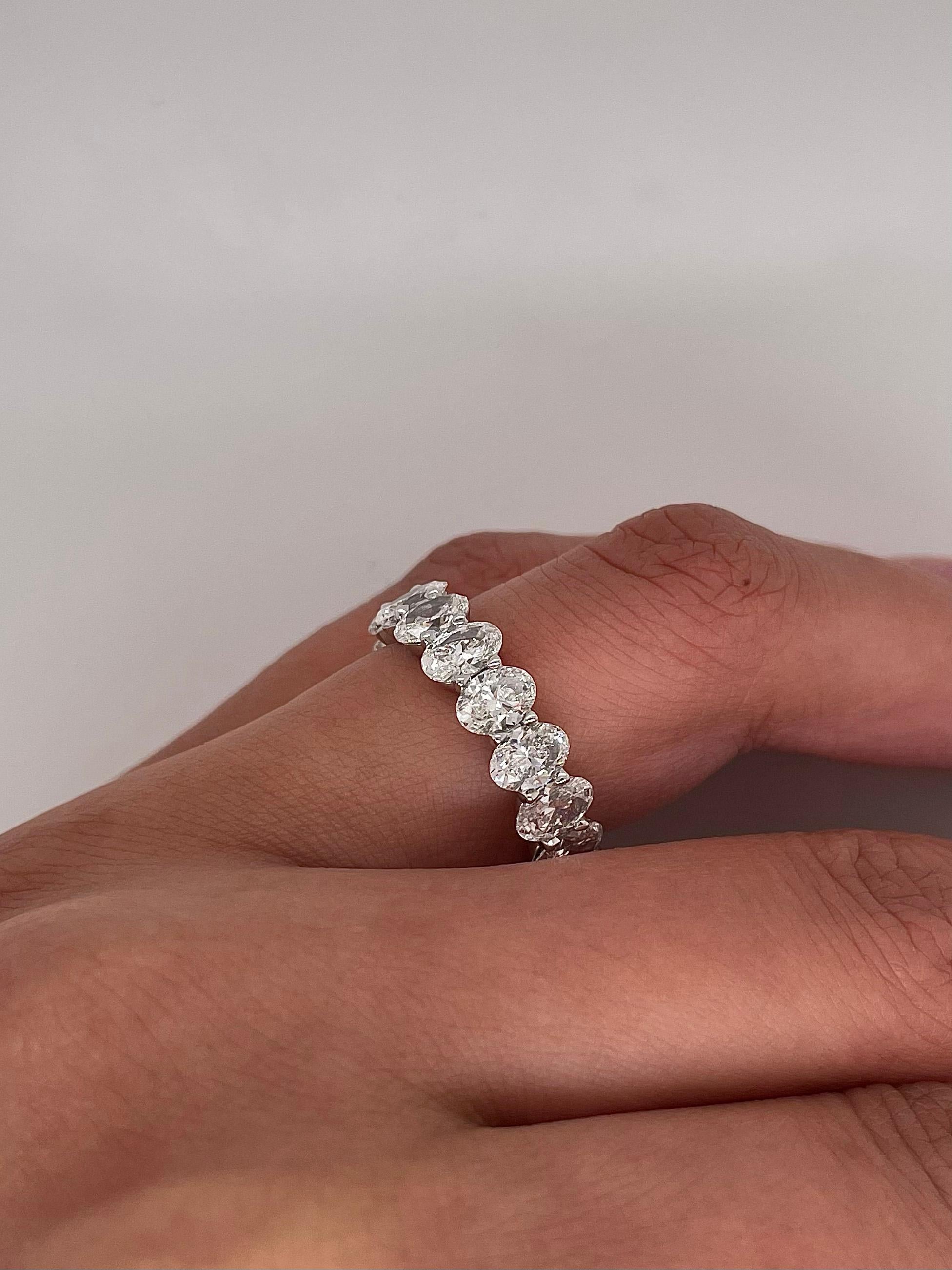 5.07 Total Carat Shared Prong Diamond Eternity Band in Platinum In New Condition For Sale In New York, NY