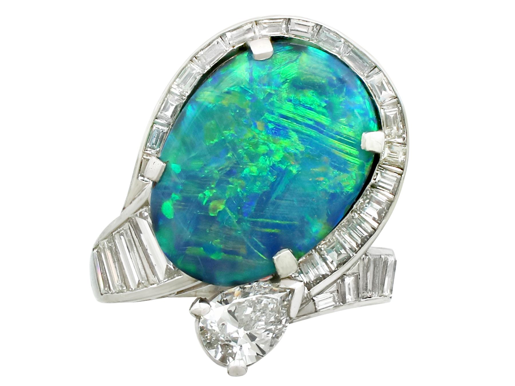 A stunning vintage 1950's 5.08 carat black opal and 2.49 carat diamond, platinum dress ring; part of our diverse opal jewellery and estate jewelry collections.

This stunning, fine and impressive large opal and diamond ring has been crafted in