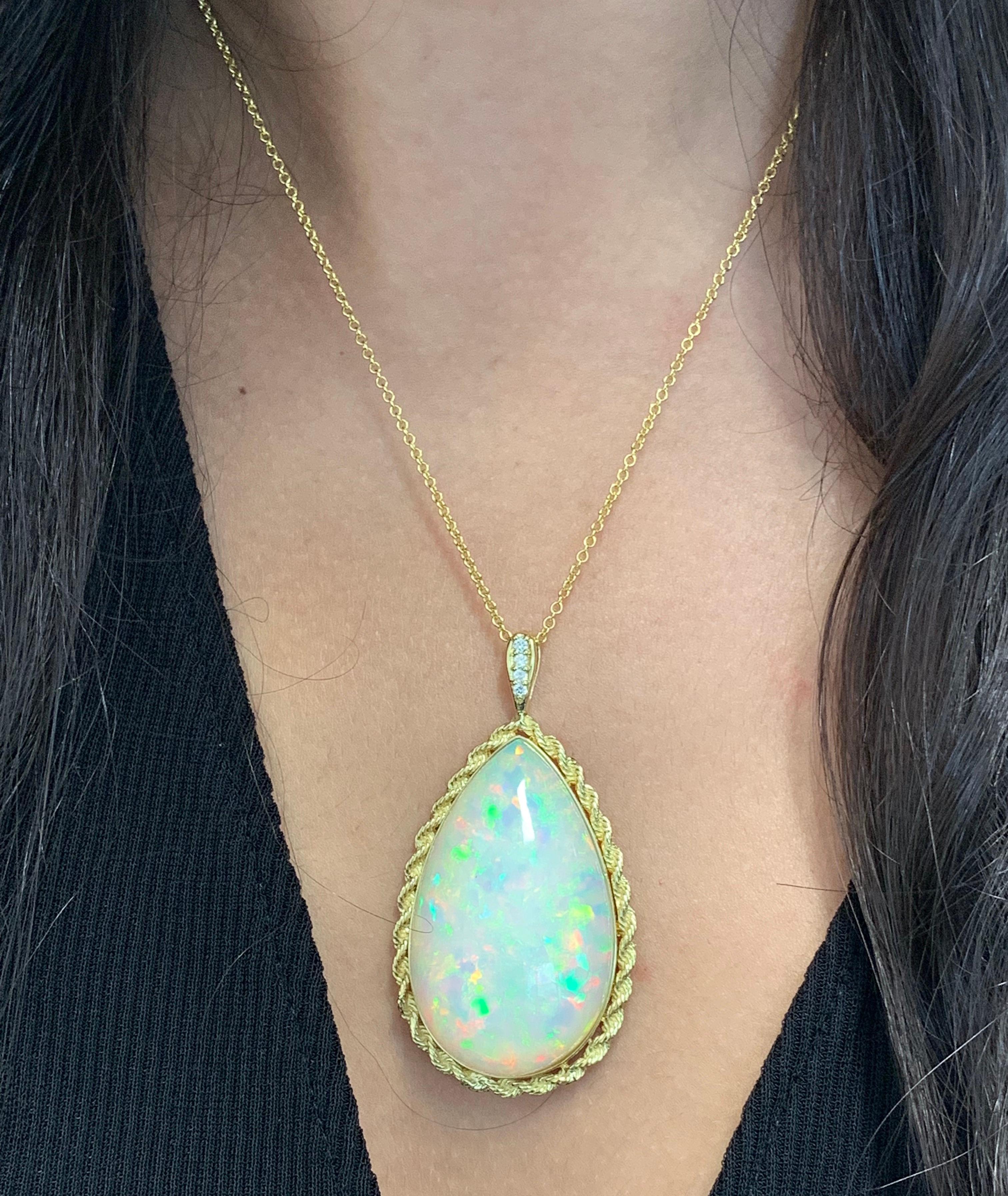 Contemporary 50.80 Carat Pear Shaped Opal and Diamond Pendant