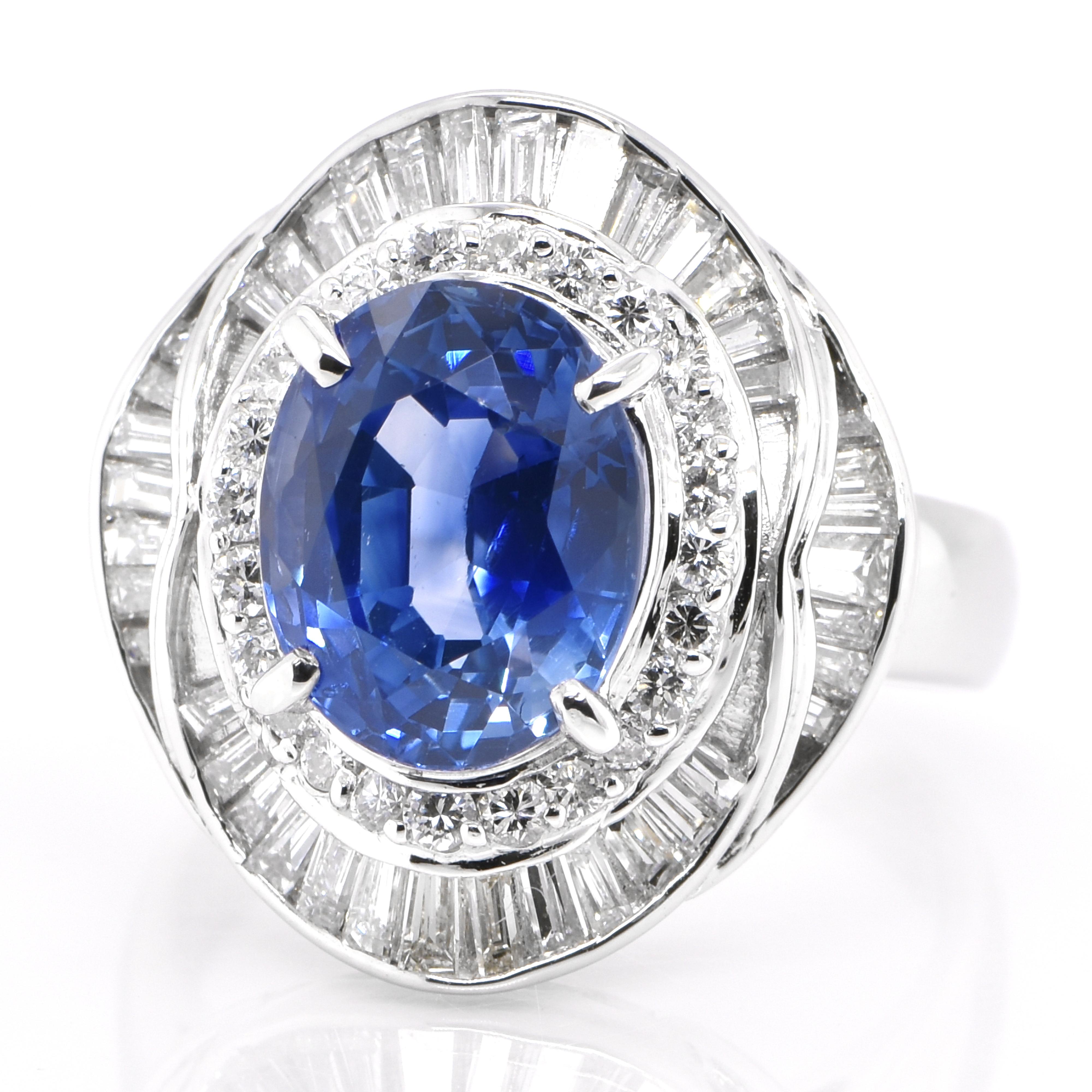 A beautiful ring featuring 5.09 Carat Natural Blue Sapphire and 1.37 Carats Diamond Accents set in Platinum. Sapphires have extraordinary durability - they excel in hardness as well as toughness and durability making them very popular in jewelry.
