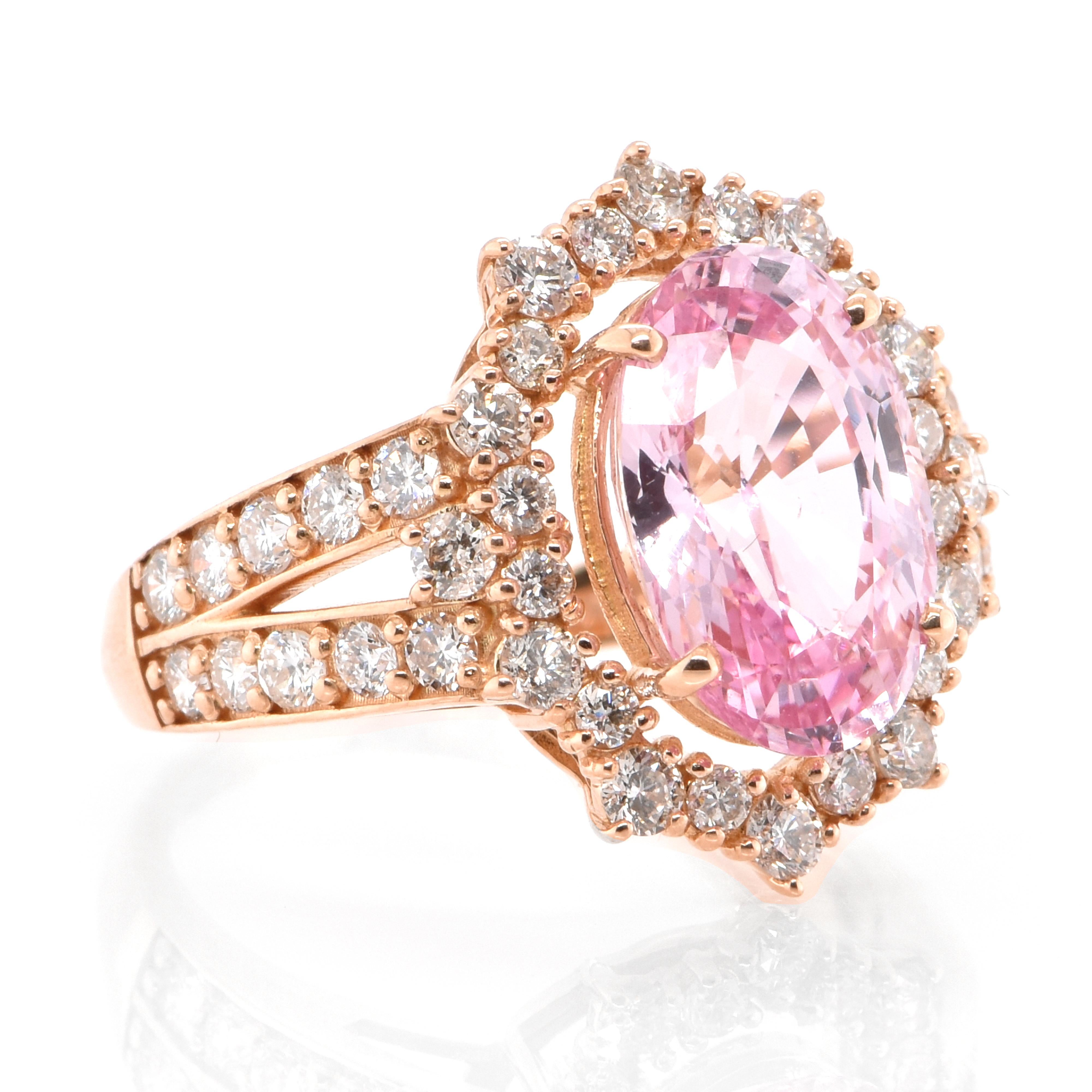 A beautiful ring featuring AIGS Certified 5.092 Carat Natural Padparadscha Sapphire and 1.30 Carats Diamond Accents set in Platinum. Sapphires have extraordinary durability - they excel in hardness as well as toughness and durability making them