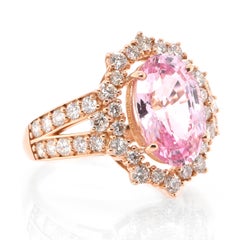 Bague en or 18 carats sertie d'un saphir padparadscha de 5,09 carats certifié AIGS et de diamants