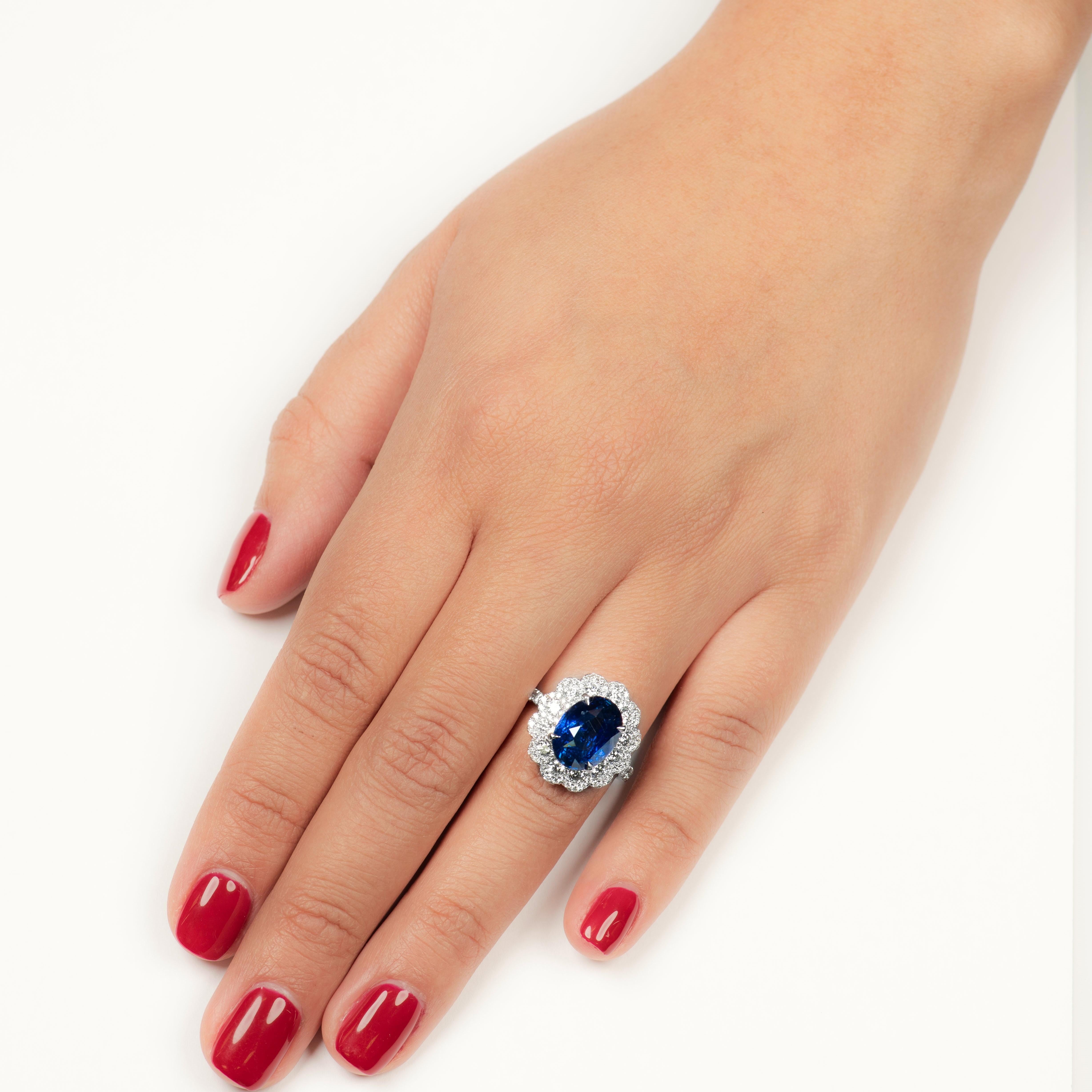 Oval Cut 5.09 Carat Natural Oval Blue Sapphire 'GIA' Flower Style Diamond Ring, 18 Karat