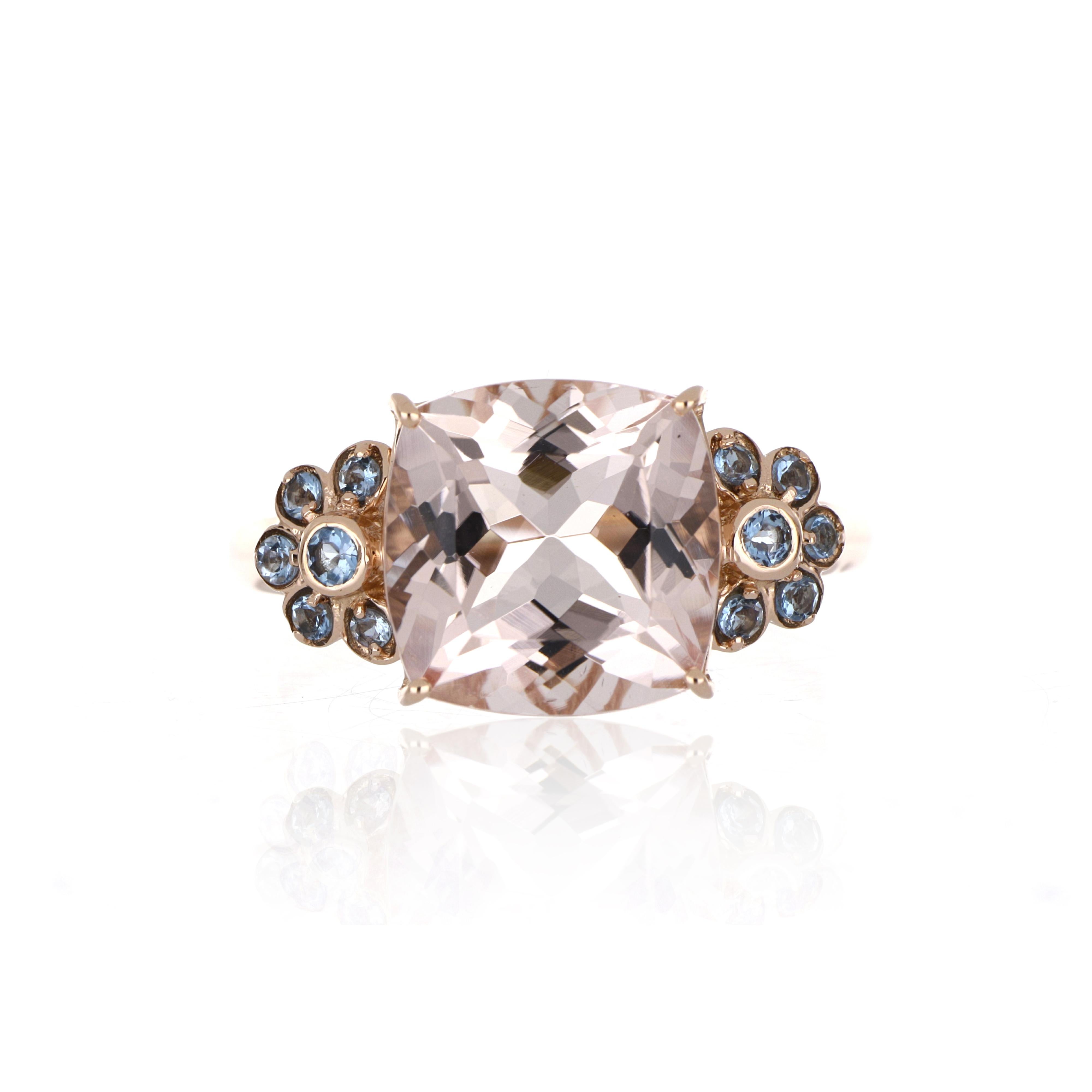 Elegant and exquisitely detailed Cocktail 14K Ring, centre set with 5.09 Ct Cushion Morganite surrounded by Bezel Set Santa Marai Aquamarine rounds total weight 0.20 cts. Beautifully Hand crafted in 14 Karat Rose Gold.

Stone Size:
Morganite: 11 x