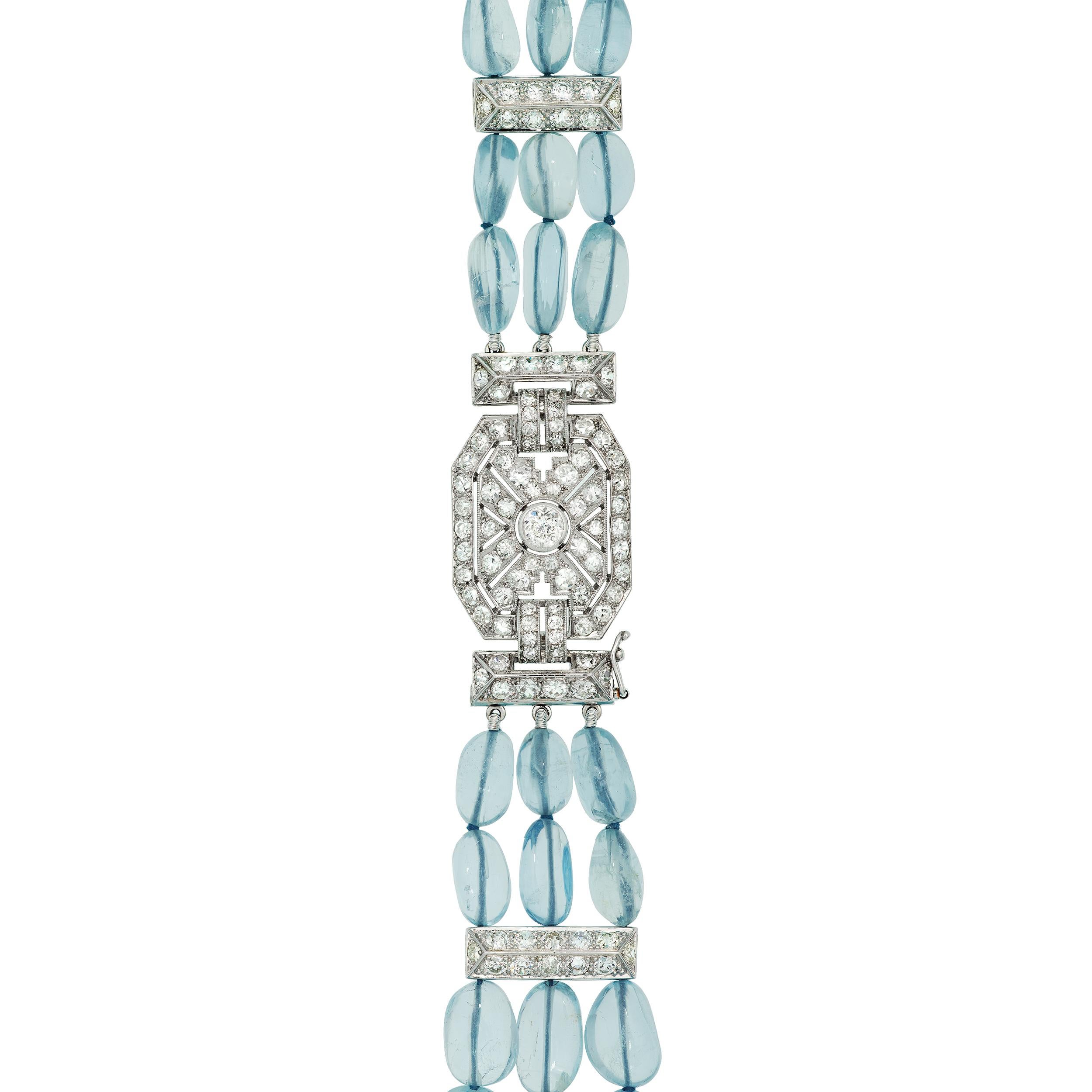 This triple-strand necklace boasts 164 smooth oval Aquamarine weighing 509.35 Carats all hand knotted to lay perfectly.  While the necklace carries substance, the smooth oval gemstones lend an organic and soft feel that allows this necklace to be