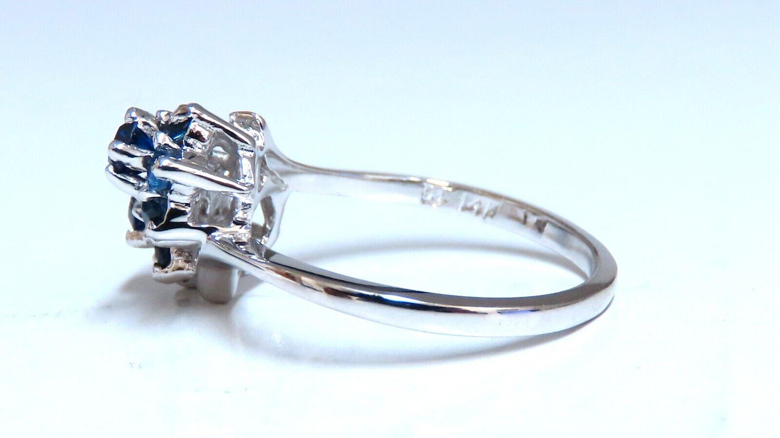 Natural sapphire cocktail bypass ring.

. 50ct. Natural round blue sapphires.

Vivid Royal blue, clean clarity and transparent


14 karat white gold 3.5 grams

12 mm wide deck

Depth of ring 7 mm

Size 6.75 and we may resize