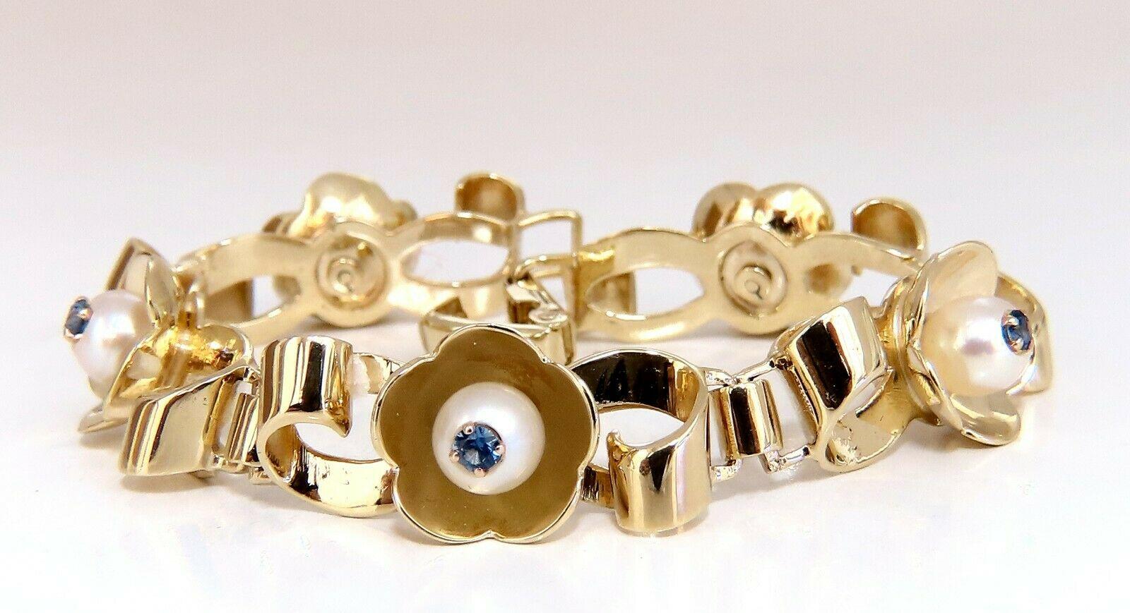 Sapphires & Pearls Floral Cluster Vintage Bracelet.
Sapphires mounted inside pearl.
.50ct Natural Round, Blue color sapphires 



6.50mm Japanese Akoya Pearls

Sapphires are of clean clarity 
Transparent and full cuts 

Bracelet is 12mm wide.

14kt
