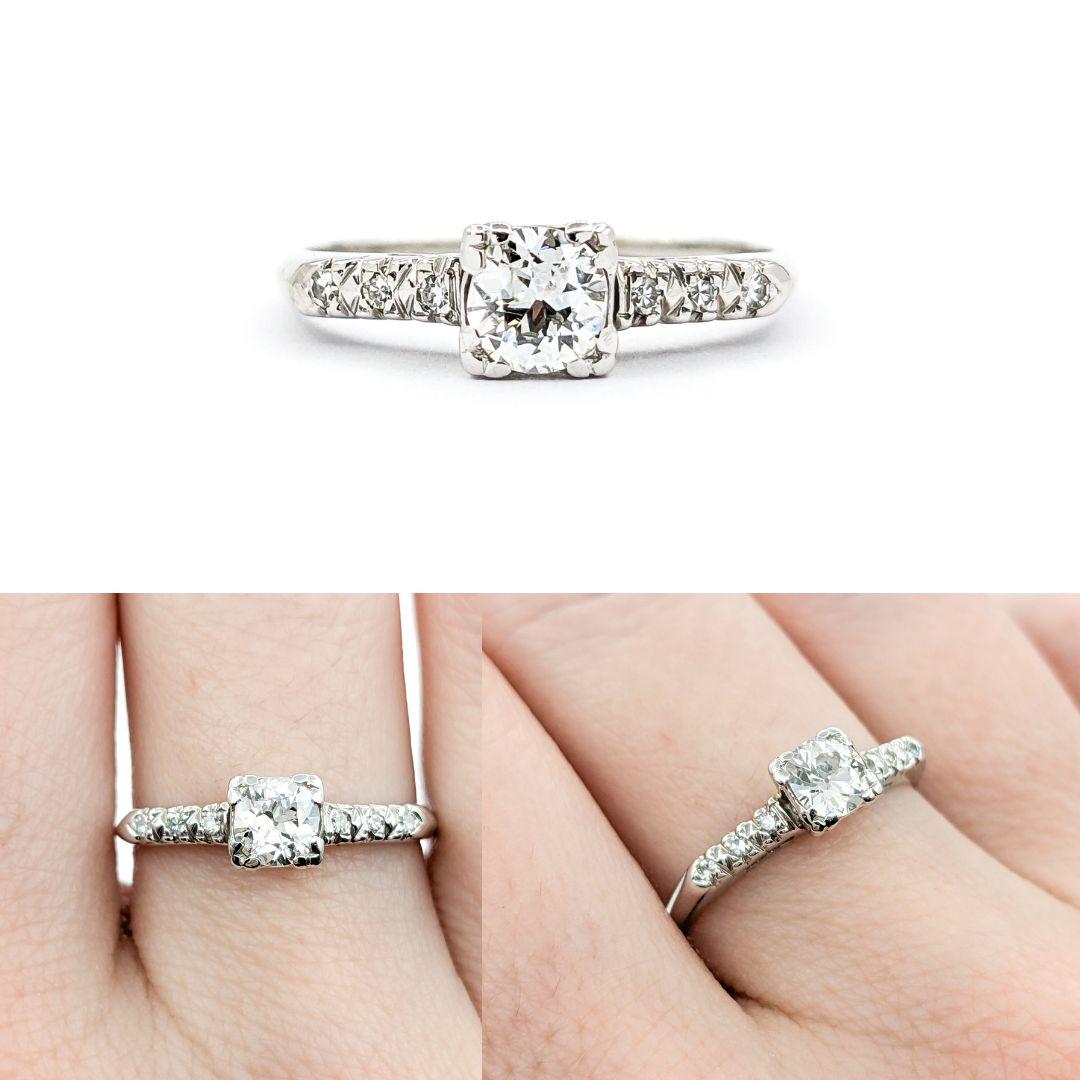 .50ctw European Cut Diamond Engagement Ring in White Gold

Introducing this beautiful Vintage Ring, crafted in 14kt white gold. The ring features a .42ct Old European cut diamond centerpiece, complemented by .08ctw diamonds. The sparkling diamonds
