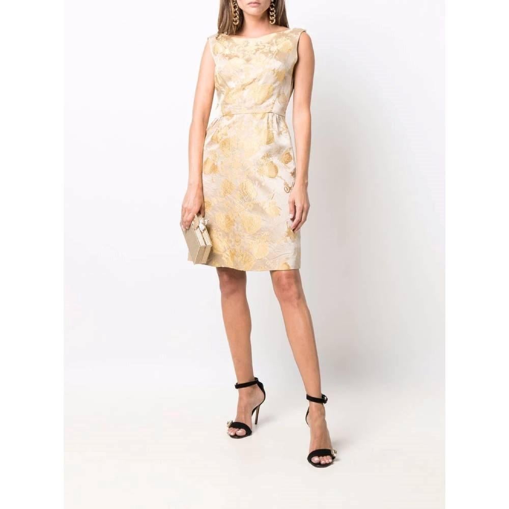 A.N.G.E.L.O. Vintage Cult beige silk sleeveless tube dress with yellow damask fantasy and lamè details. Round collar and side zip closure.

Size: 42 IT

Flat measurements
Height: 92 cm
Bust: 42 cm
Waist: 35 cm
Hips: 49 cm

Product code: