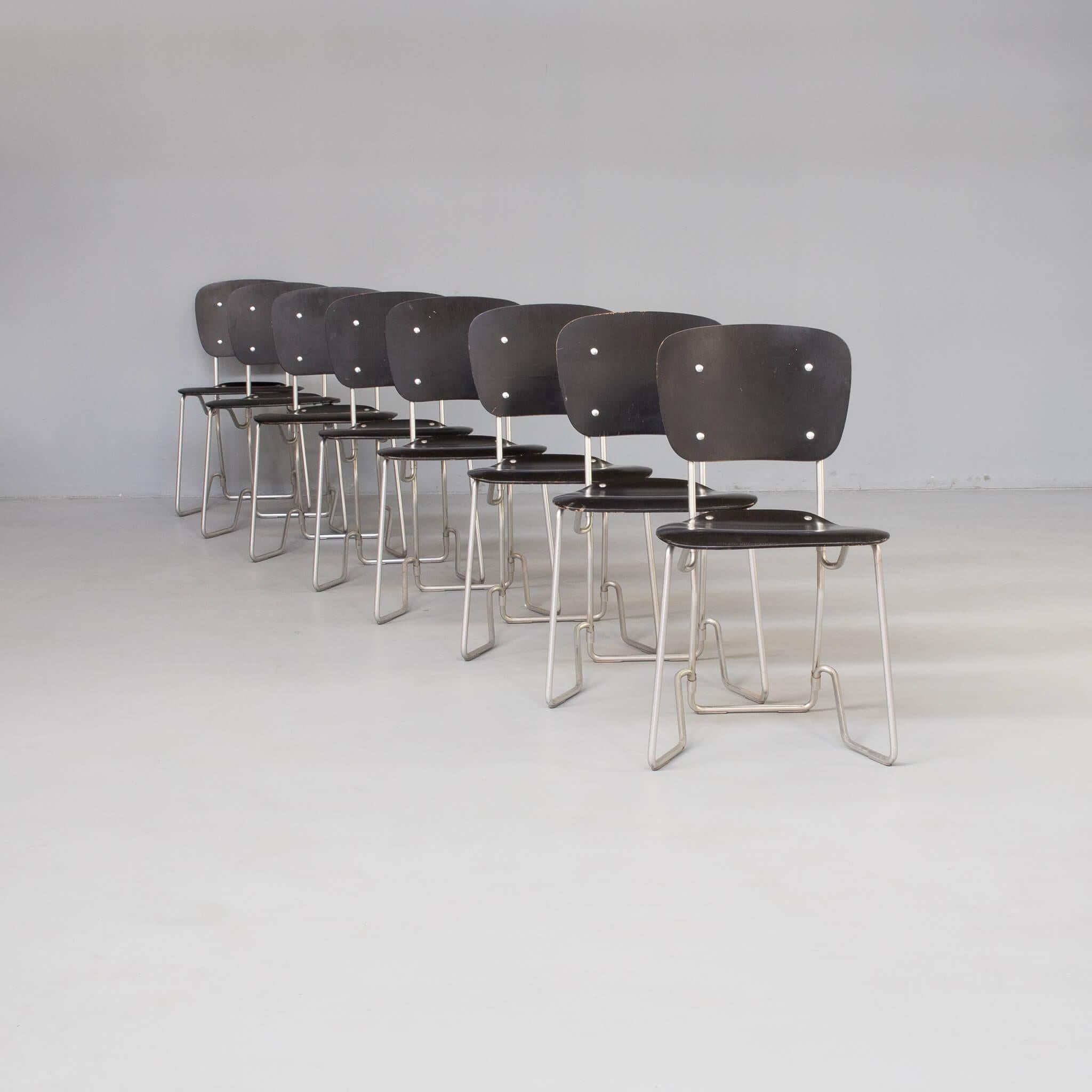 Rare set of 8 folding chairs, model “Aluflex”. Designed by Armin Wirth. They have a nice, modern style with an industrial touch. The wooden seat and back are held by aluminium metal frame. The seat has a unique folding mechanism for easy stacking