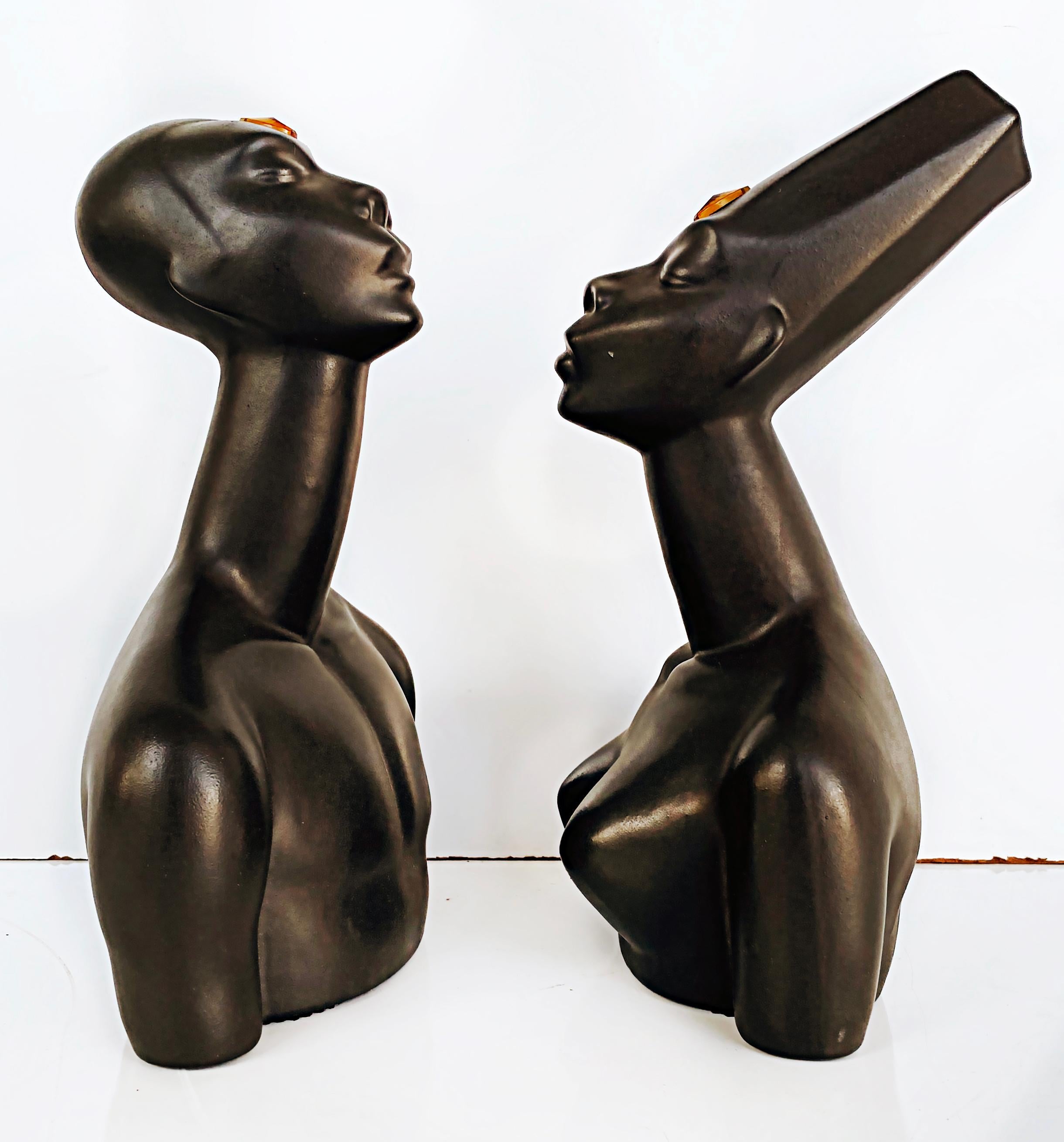 50s California Modern Brayton Laguna pottery African busts male, female.

Offered for sale is a rare and highly collectible pair of California Mid-Century Modern ceramic pottery busts by Brayton Laguna Pottery and designed by Peter Ganine circa