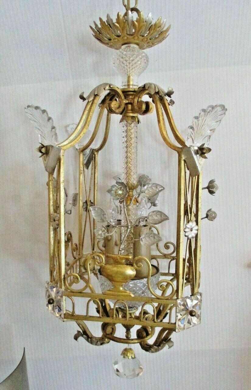 This Beautiful Lantern is a 1950's Hollywood Regency Gilt & Silvered Iron Framed Cut Crystal Floral Form Ceiling Lantern.  Germen estate find. This piece is beautifully detailed. Attributed to Maison Bagues.