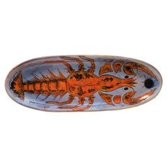 Essai français des années 50 en céramique rouge et blanche avec homard peint