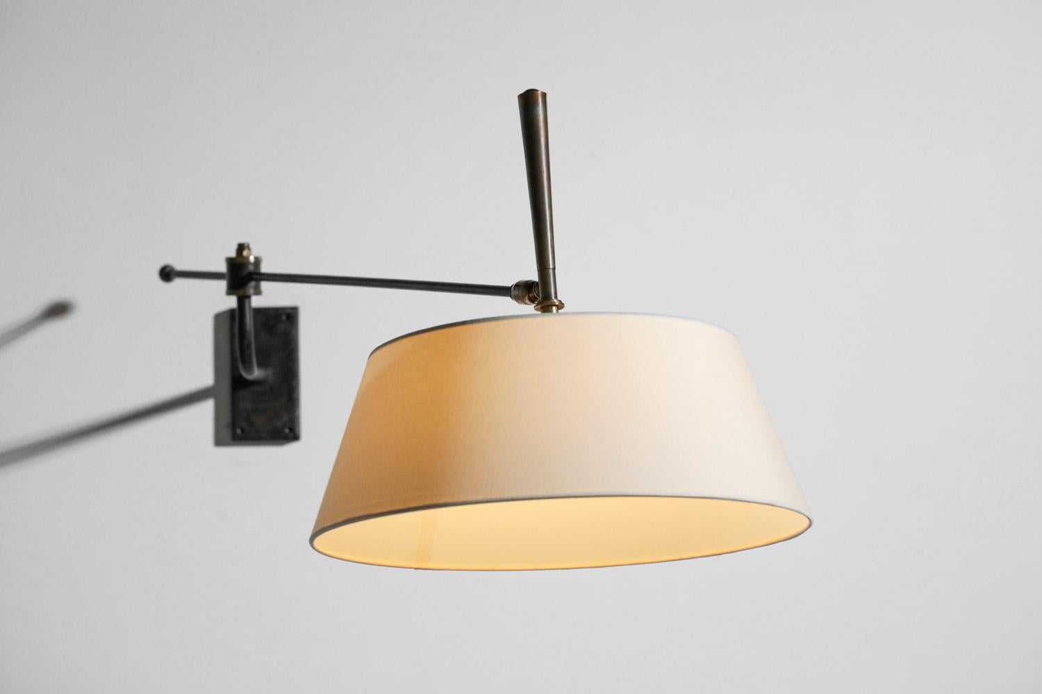 Lacquered 50's French wall lamp in black lacquered metal midcentury swing attr. arlus  For Sale