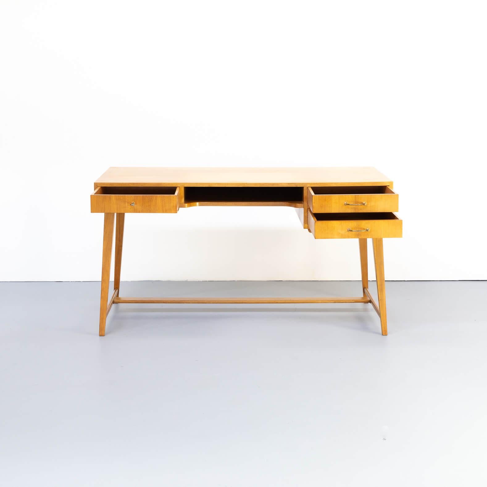Georg Satink designed this model 468 deskin the 1950s for WK Möbel, the desk is beautiful on each visible side. Three drawers. Desk in good condition consistent with age and use.