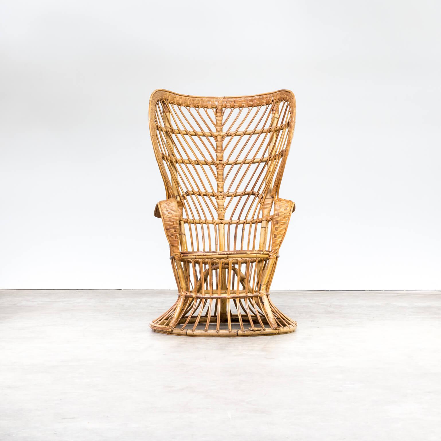 1950s Lio Carminati ‘biancamano’ wicker chair for Pierantonio Bonacina. This Italian handcrafted midcentury rattan high back armchair was designed by Lio Carminati in the 1950s and manufactured by Pierantonio Bonacina. The item was specifically