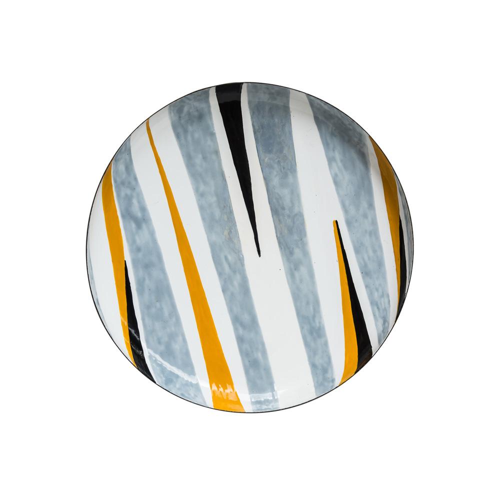 A large and very beautiful artistic circular plate 1950s Italian design by Silvia Poggi Bonzi. Abstract Enamel decor on metal white, gray, yellow, black. Curved edge.
This bowl could be used to hold objects such as keys etc. or just used an a
