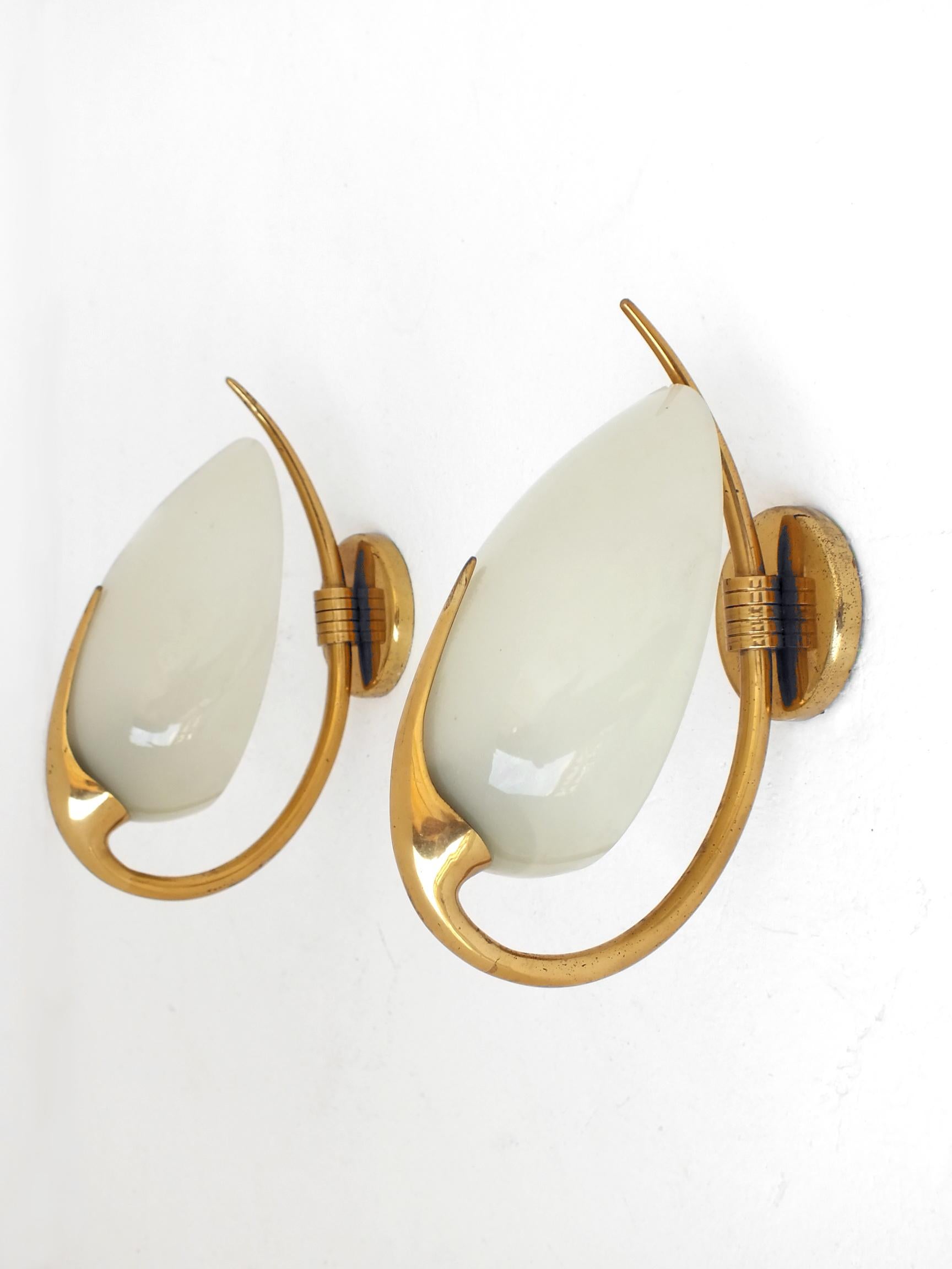 Lumen Milano Italy prod, two wall lamp Oscar Torlasco design years '50 Lumi Italy

 Structure in brass and glass with one delicate shade cream/light green

 Very good condition for the structure in brass and also for the glasses,
 Only in one