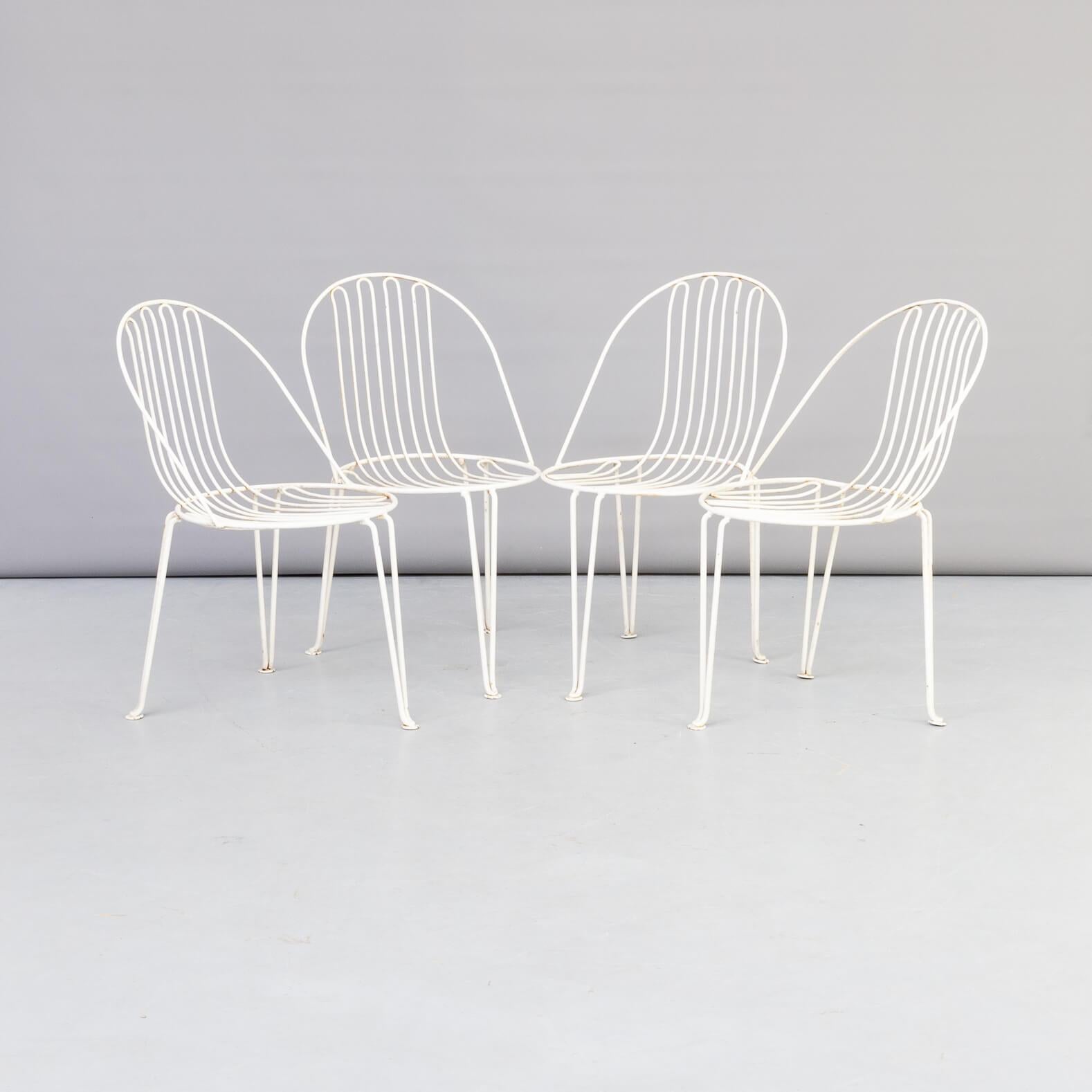 Rare set of metal garden chairs, one dining table and 1 side table. The dining table is just the framing; a glass table top could complete the table.