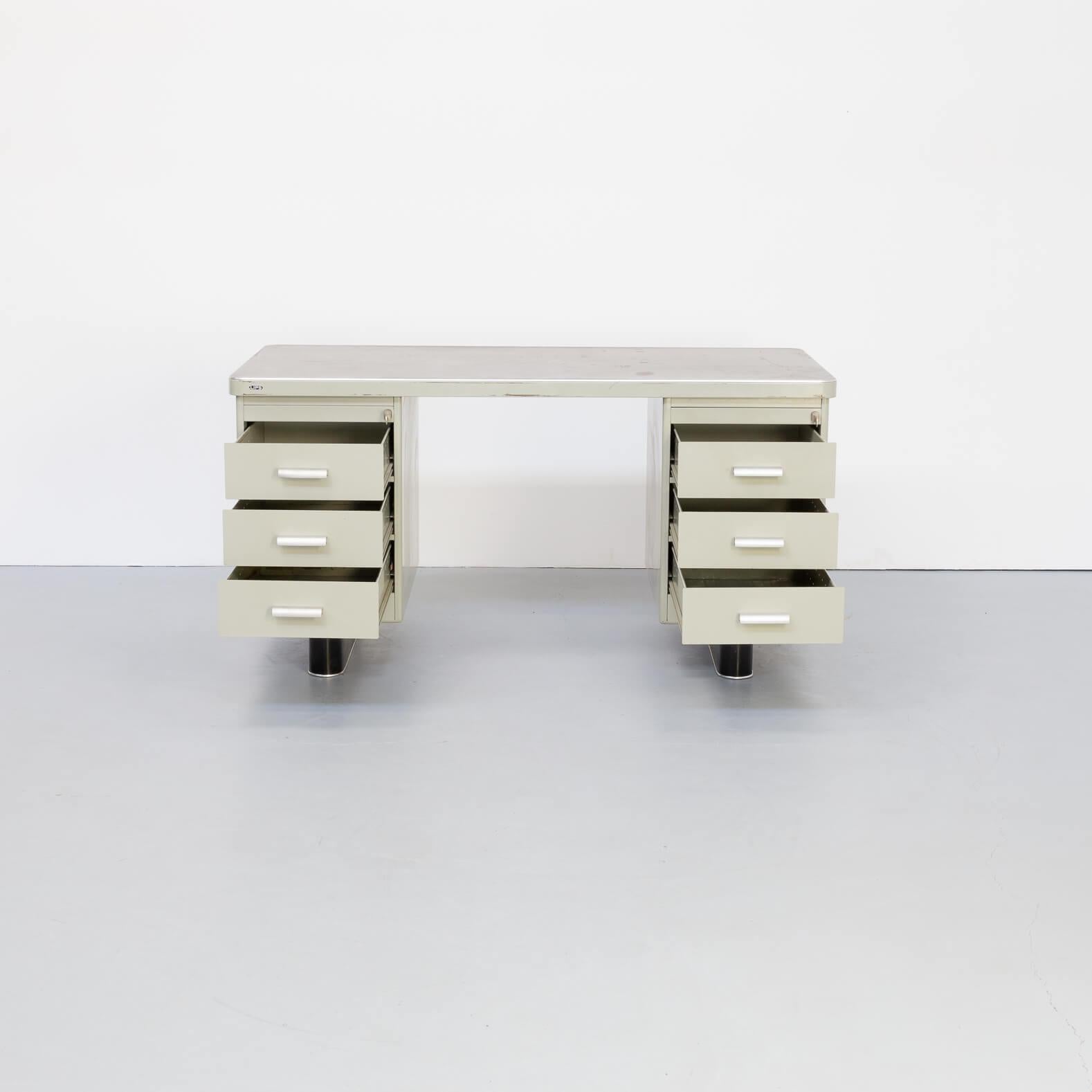 In the 1950s-1960s work changed more and more from handwork in factories towards desk sitting work. There was a huge demand in the market for solid Industrial but mainly practicial writing desks. Lips in the Netherlands designed a number of those