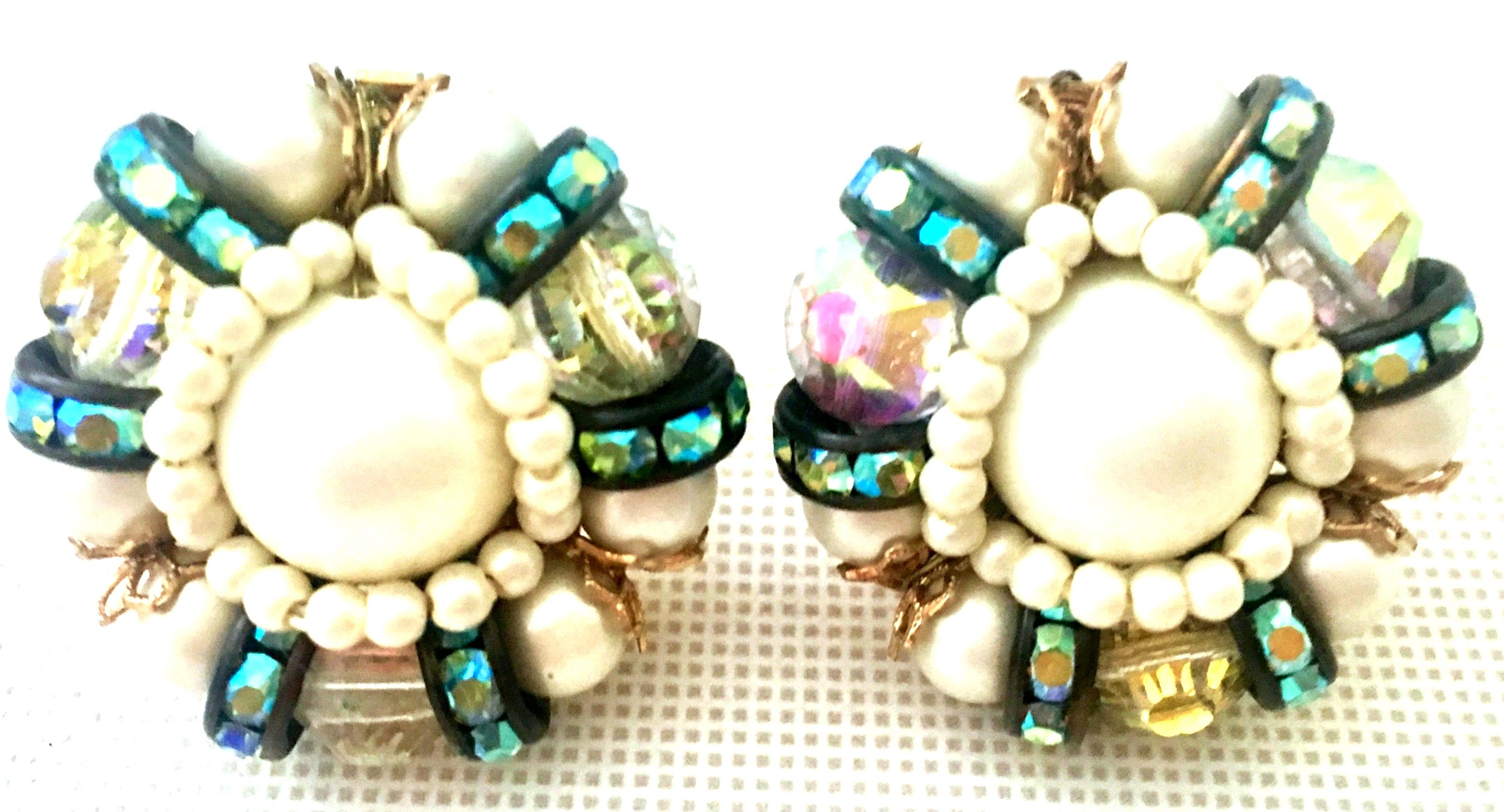 1950'S Pair Of Gold Plate, Faux Pearl, Art Glass & Swarovski Crystal Abstract Floral Earrings By, Hobe. These finely crafted gold plate earrings feature faux pearl milk glass beads with Swarovski Aurora Borealis Crystal. Each gold plate filigree