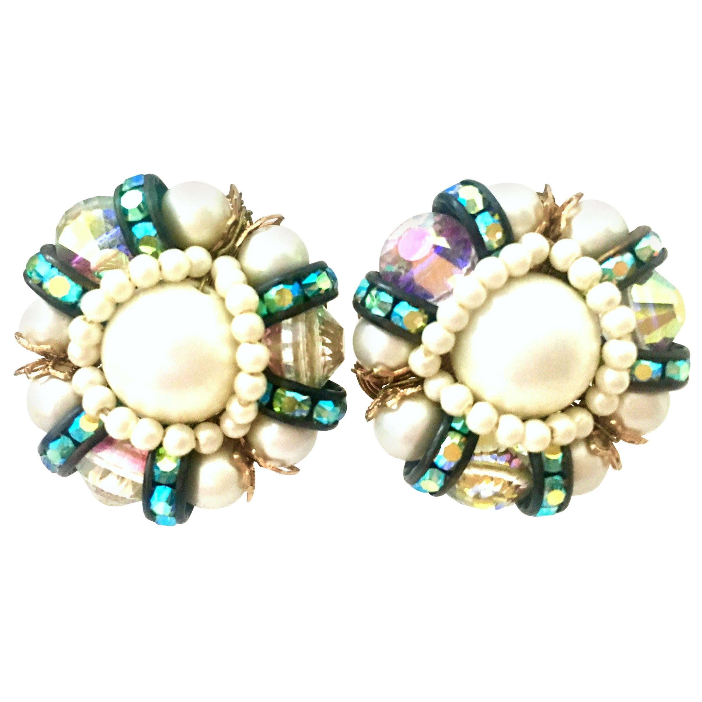 1950'S Pair Of Gold Plate, Faux Pearl, Art Glass & Swarovski Crystal Abstract Floral Earrings By, Hobe. These finely crafted gold plate earrings feature faux pearl milk glass beads with Swarovski Aurora Borealis Crystal. Each gold plate filigree