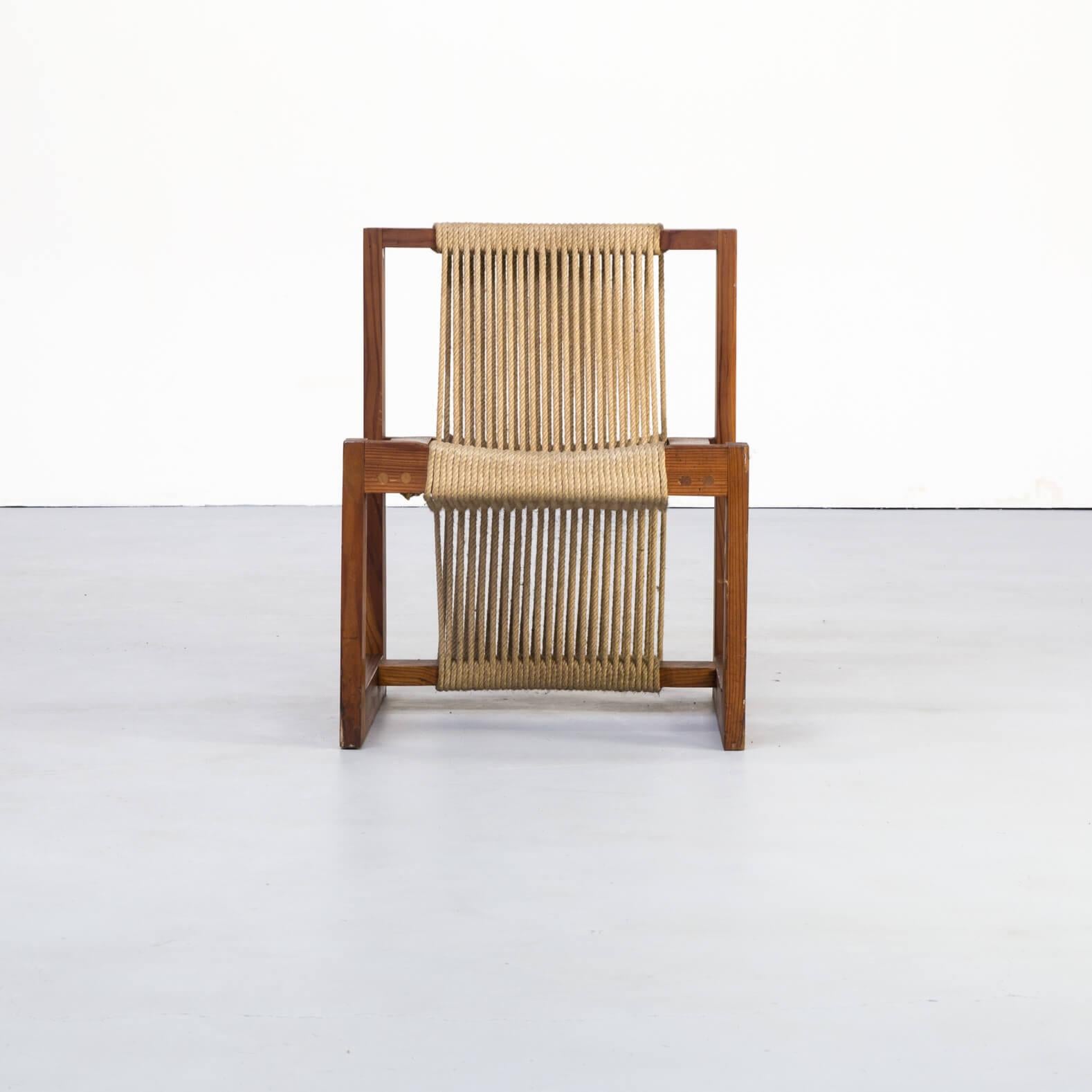 1950s rope chair in pine wood. This chair of darkened pine wood and its strong square looks would be attributed to Scandinavian designers, with a lot of high quality in the used design. Chair is in good condition consistent with age and use.
