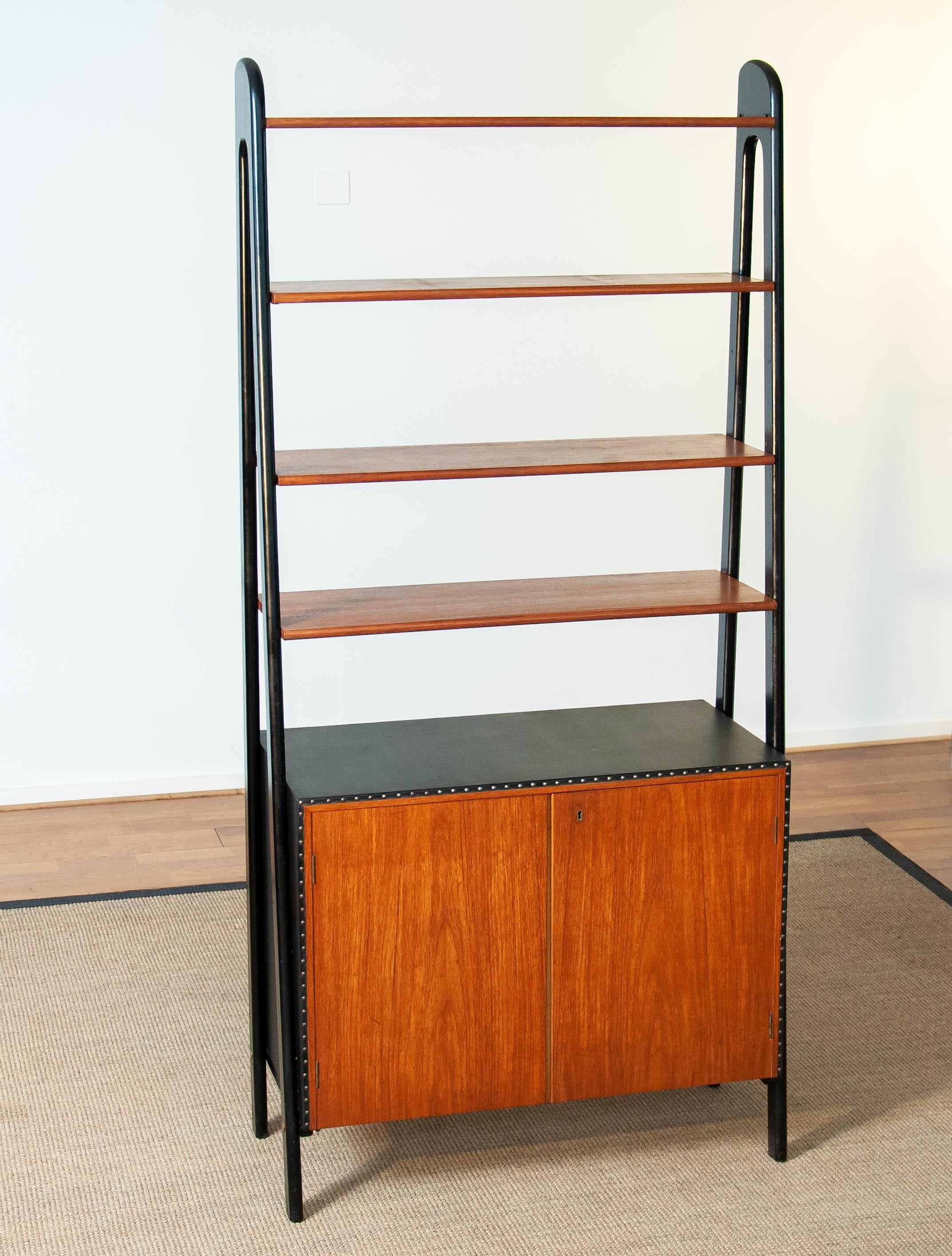 Mid-20th Century 50s Teak and Nailed Black Faux Leather Bookcase and Cabinet by Bertil Fridhagen