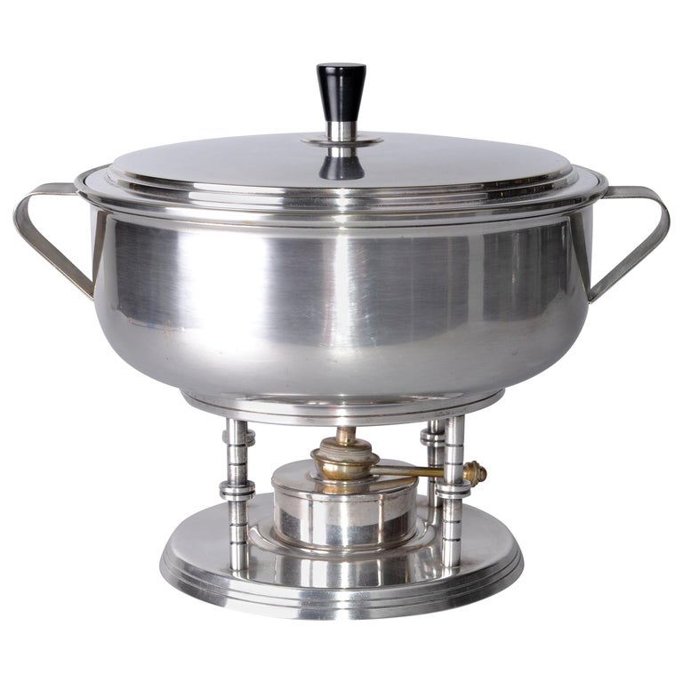 https://a.1stdibscdn.com/50s-tommi-parzinger-silver-plate-serving-bowl-food-warmer-for-mueck-cary-for-sale/1121189/f_171037121575532645501/17103712_master.jpg?width=768