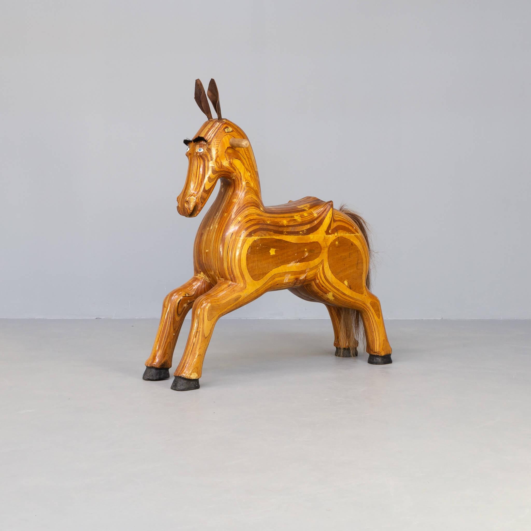 Beautiful and rare decorative object. This horse stands alone and this object is a beautiful decorative object matching in lots of different interiors. From the inside build up in layers wood. Beautiful made.