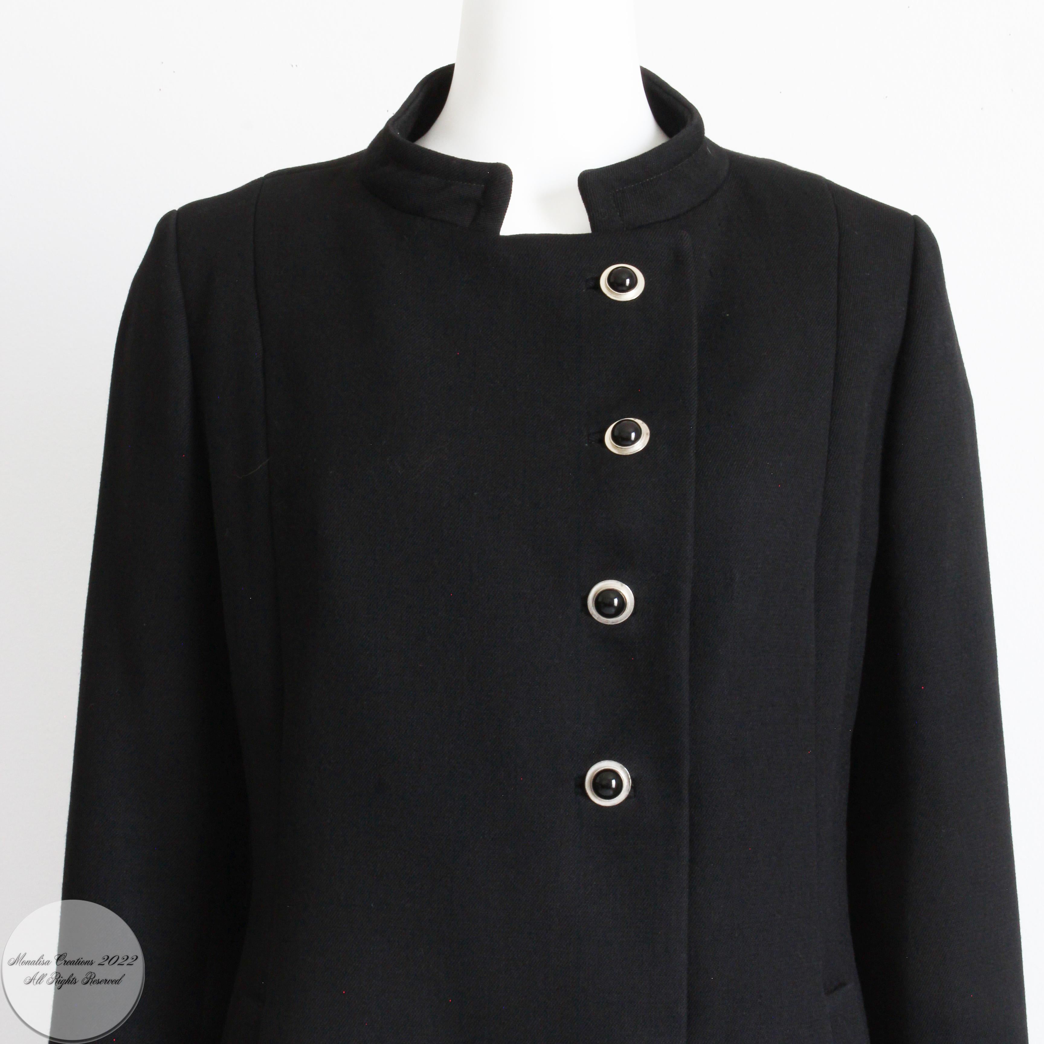 Vintage military style virgin wool coat, made by Zelinka Matlick and sold by high end apparel store Martins of Brooklyn, most likely in the mid 50s. Made from black virgin wool, the tailoring is downright amazing on this coat! It fastens with black