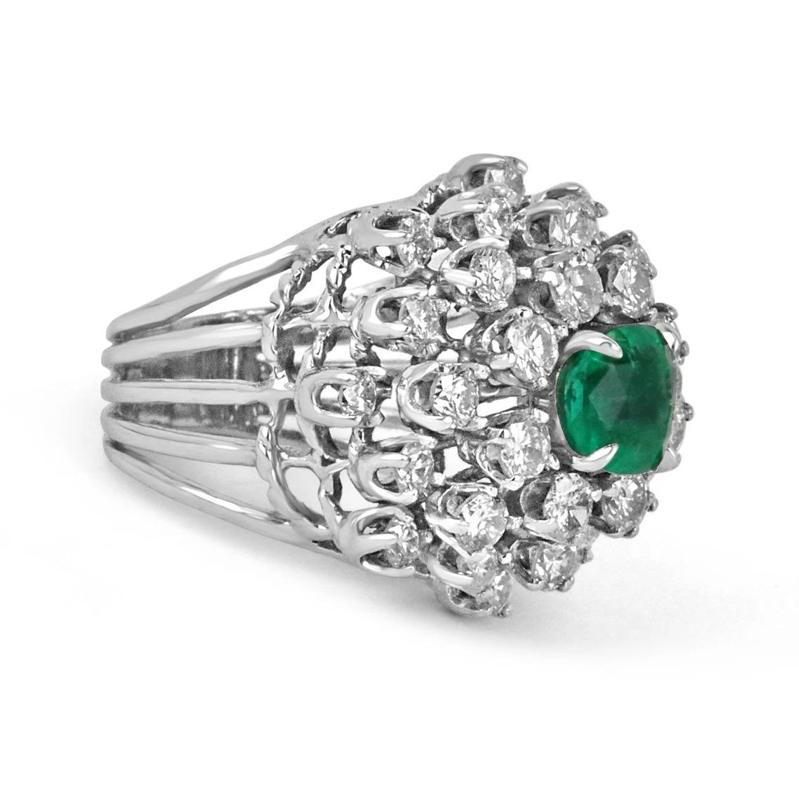 Featured here is a stunning emerald and diamond cocktail ring. Reminiscent of cocktail parties from the era of “Mad Men”, this ring is sure to be the talk of the evening. The ring features a vibrant 1.40-carat Colombian emerald that is set in a