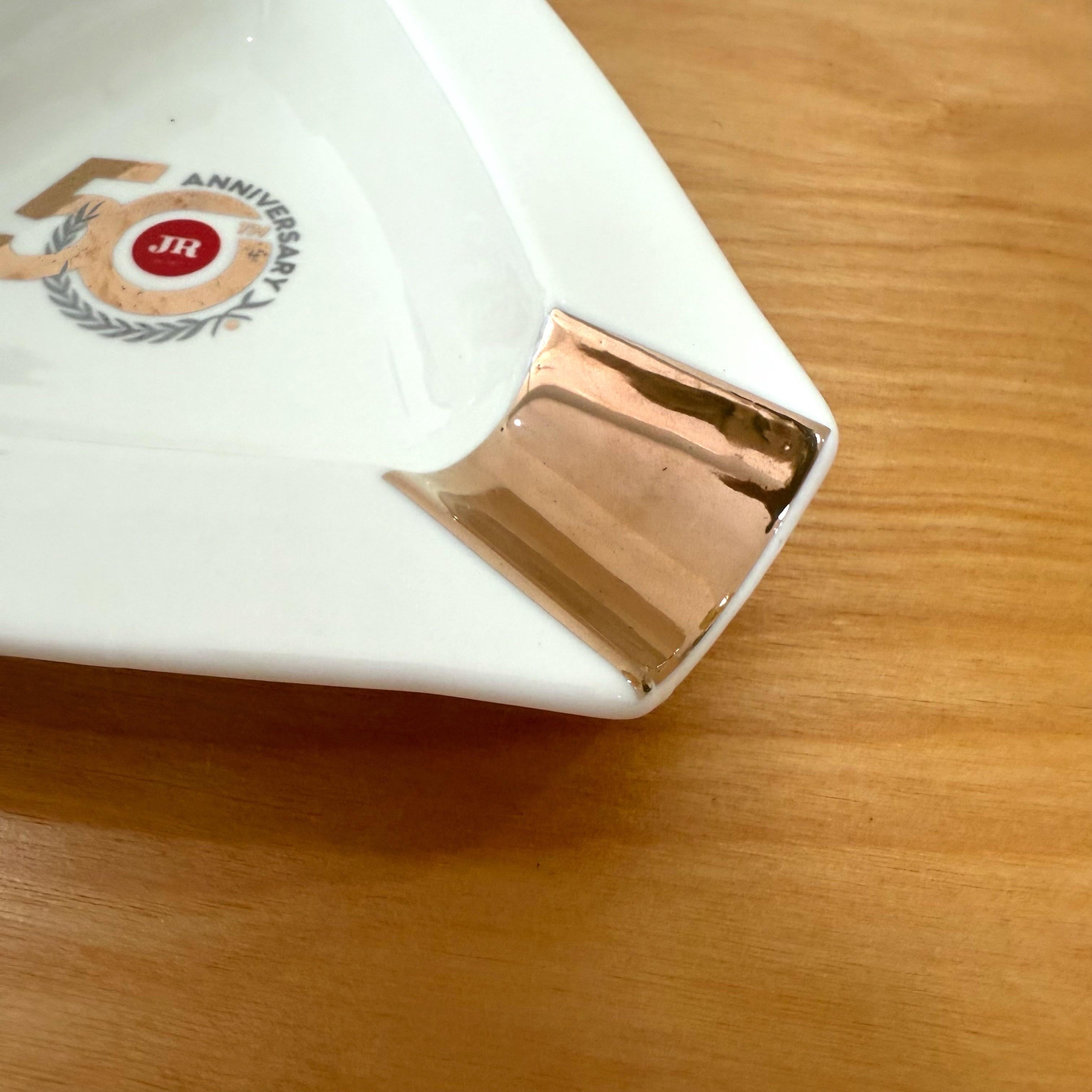 This Cigar Ashtray is a must-have for any collector or enthusiast. It is preowned and in excellent condition, no chips, cracks or smudges. I don’t think it has ever been used. With its elegant design and classic colors of gold and white, it is