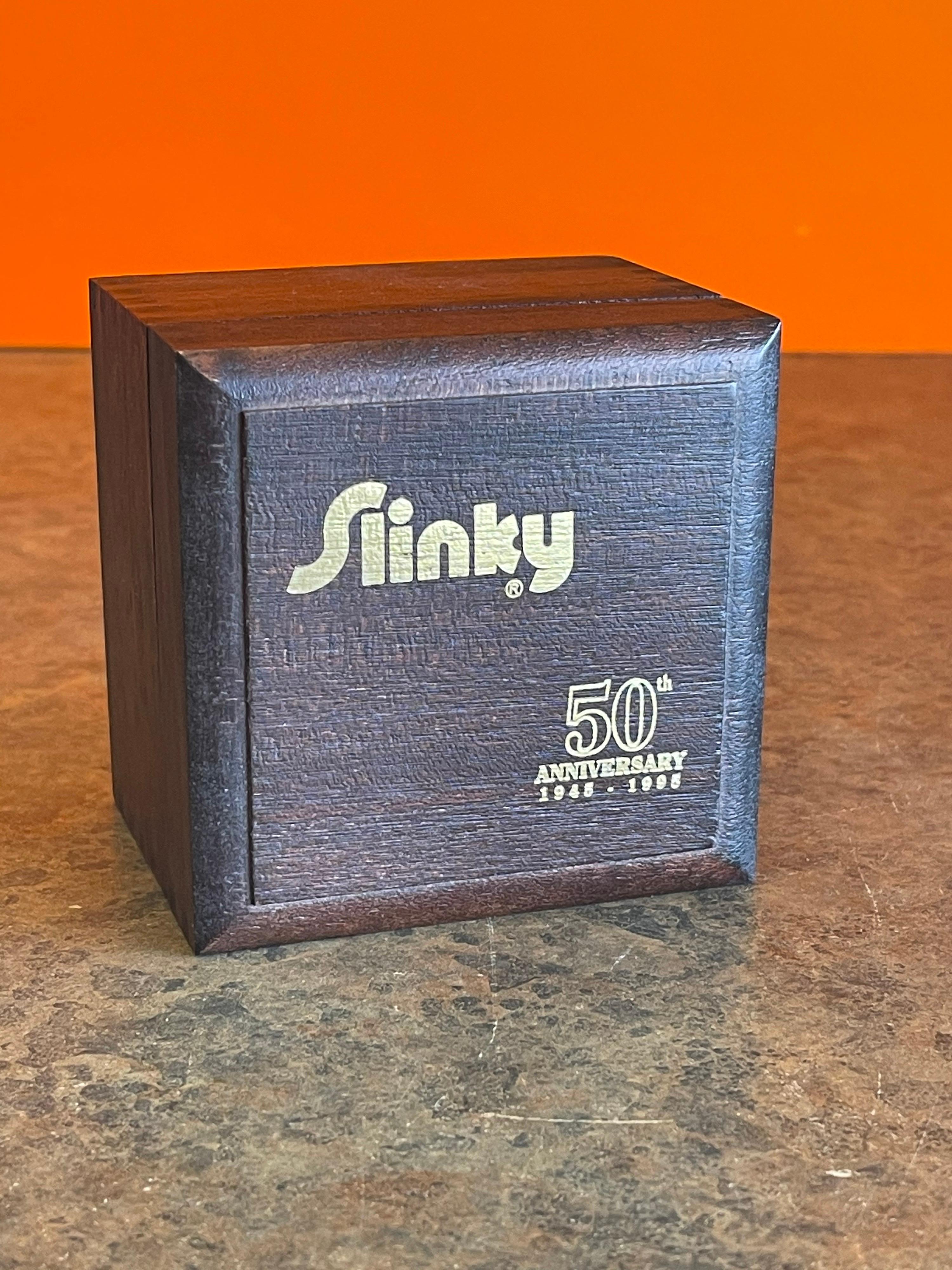 50th Anniversary Gold-Plated Slinky Toy in Wood Box In Excellent Condition In San Diego, CA