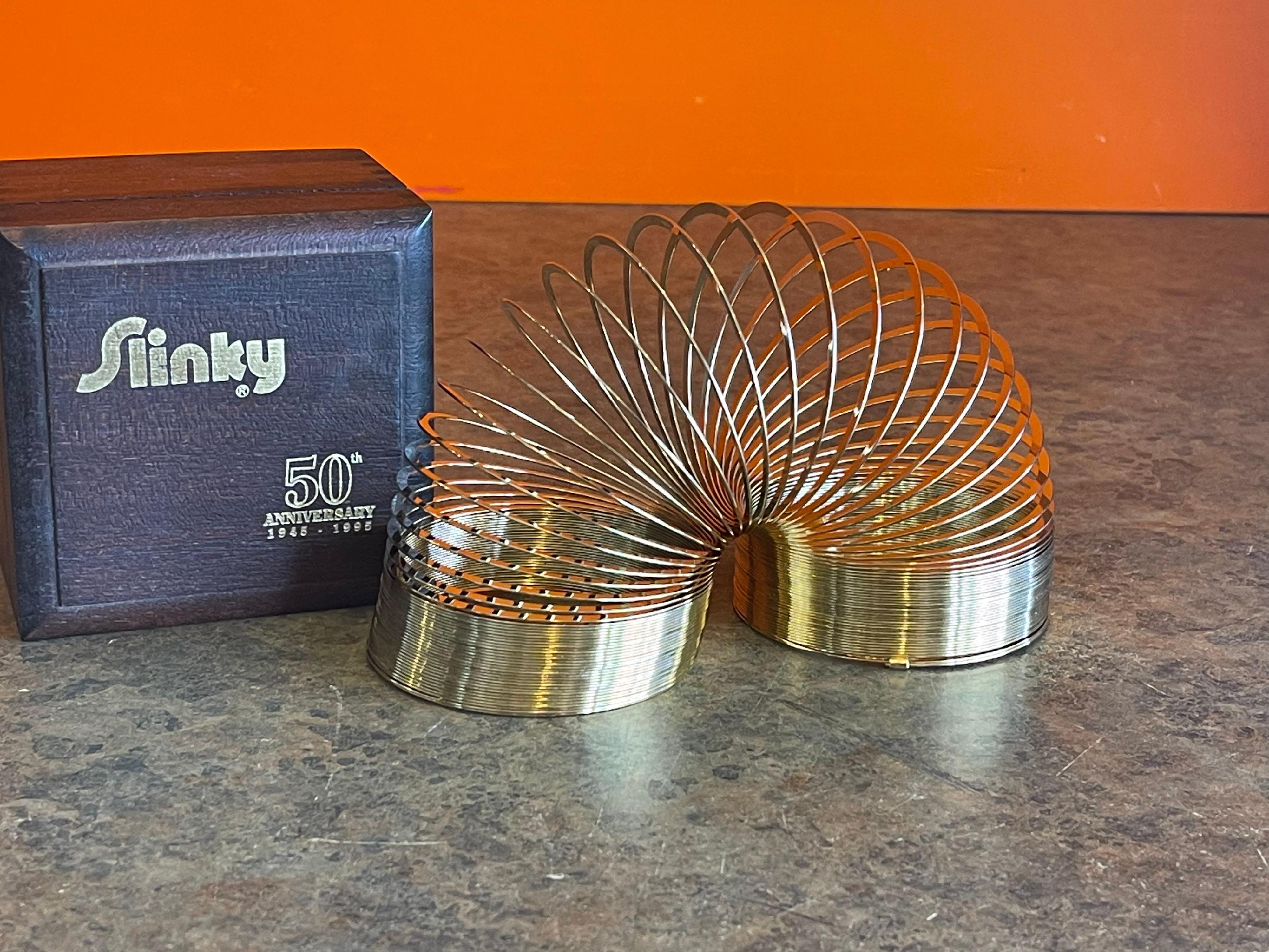 50th Anniversary Gold-Plated Slinky Toy in Wood Box In Good Condition In San Diego, CA