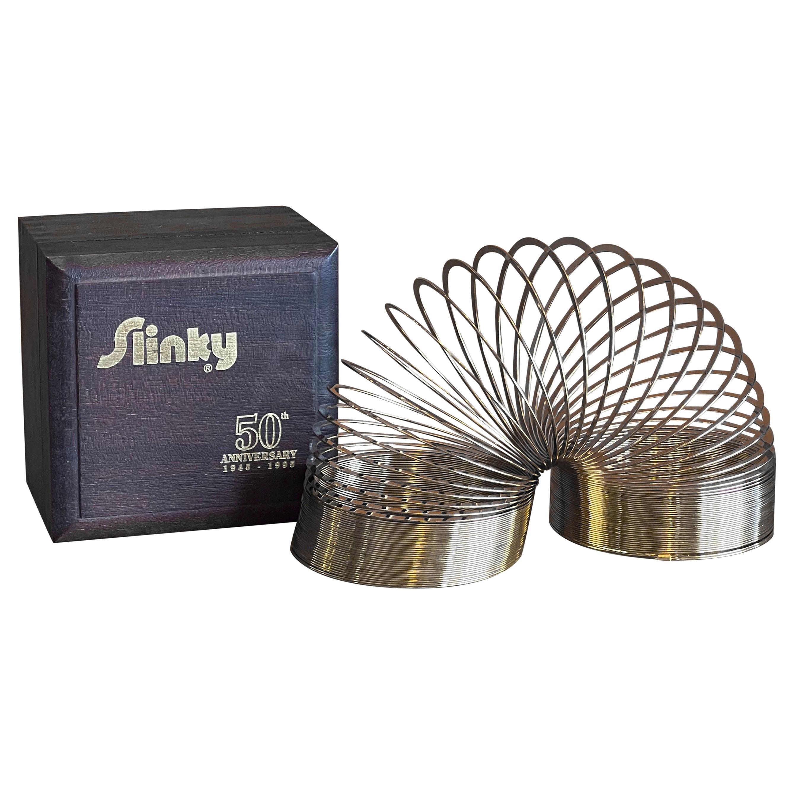 50th Anniversary Gold-Plated Slinky Toy in Wood Box, New Condition