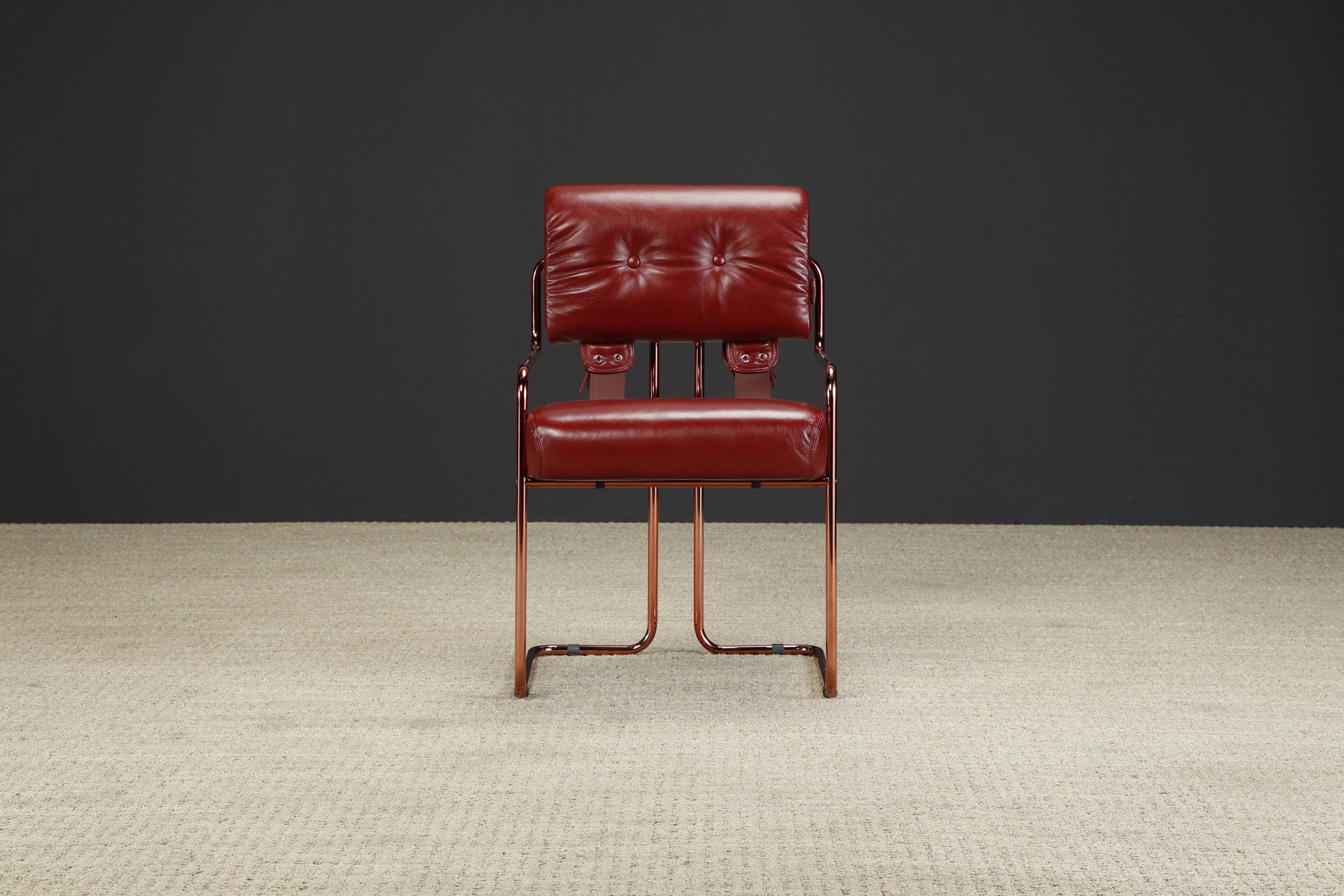Currently, the most coveted dining chairs by interior designers are 'Tucroma' chairs by Guido Faleschini for i4 Mariani, and we have this incredible Tucroma armchair in beautiful deep red, almost burgundy, leather with polished red tinted frames