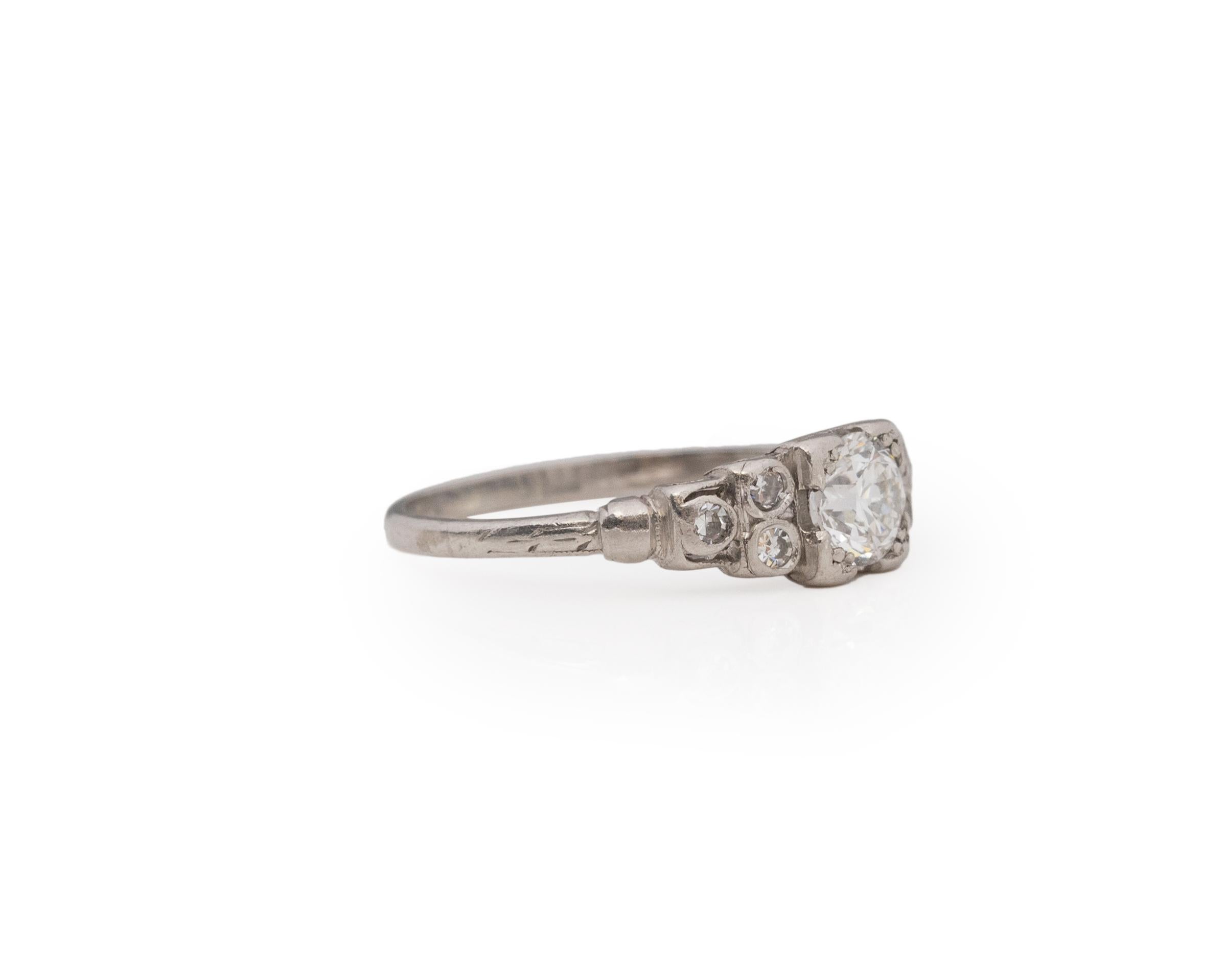 Ring Size: 5.75
Metal Type: Platinum [Hallmarked, and Tested]
Weight: 2.5 grams

Center Diamond Details:
Weight: .51ct
Cut: Old European brilliant
Color: F
Clarity: VS1

Finger to Top of Stone Measurement: 5mm
Condition: Excellent
