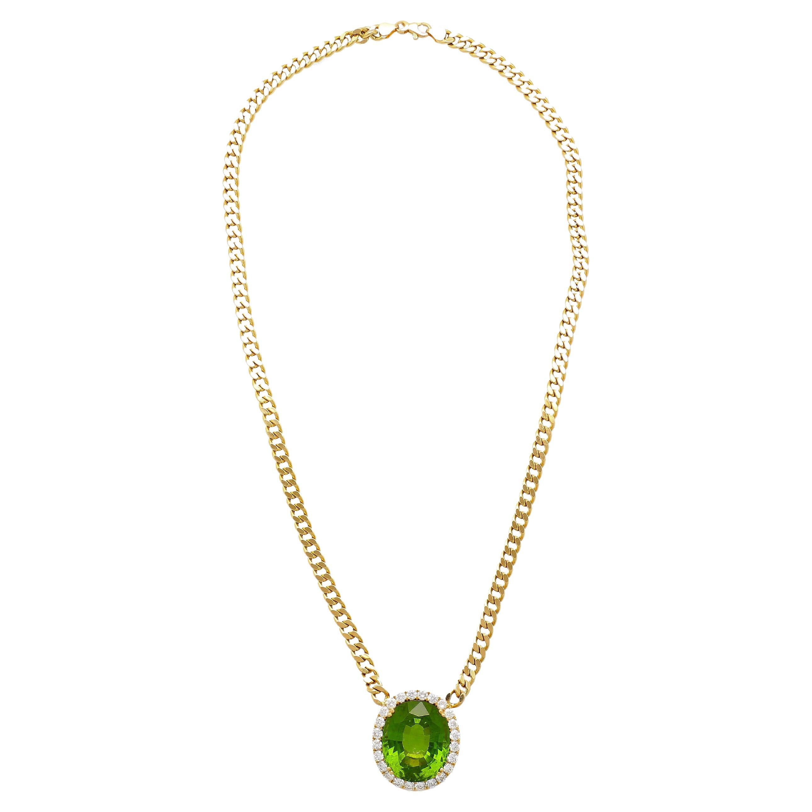 Featuring a GRS certified 51 carat green oval cut peridot embraced by a diamond halo, the pendant is exquisitely crafted in an 18K yellow and white gold setting. Suspended from a 22