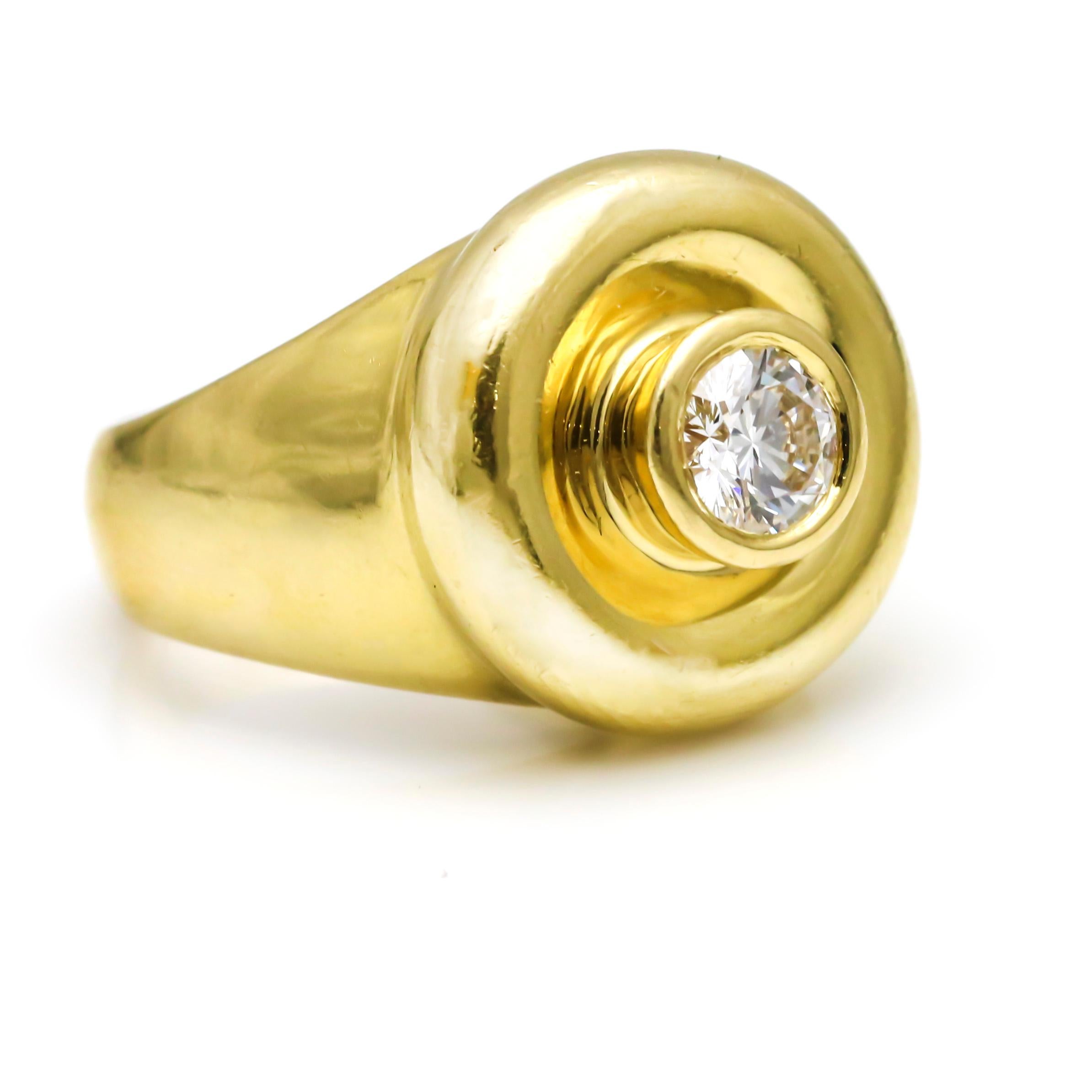 Vintage Tiffany & Co. Paloma Picasso diamond ring in 18 karat yellow gold. Bezel set Tiffany diamond center stone. Diamond total carat weight, .51 carat. Size 5. Circa 1980s. Weight, 13.2 grams.