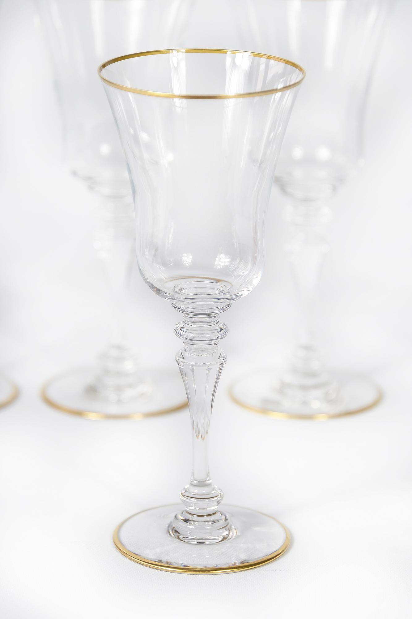 Set of 45 Baccarat crystal glasses with gold trim details.
12 pcs. champagne flute glasses (H 22 x 6 cm)
11 pcs. red wine glasses
10 pcs. white wine glasses
12 pcs. wine glasses
Marked on the bottom, several with labels.
Excellent condition.

 