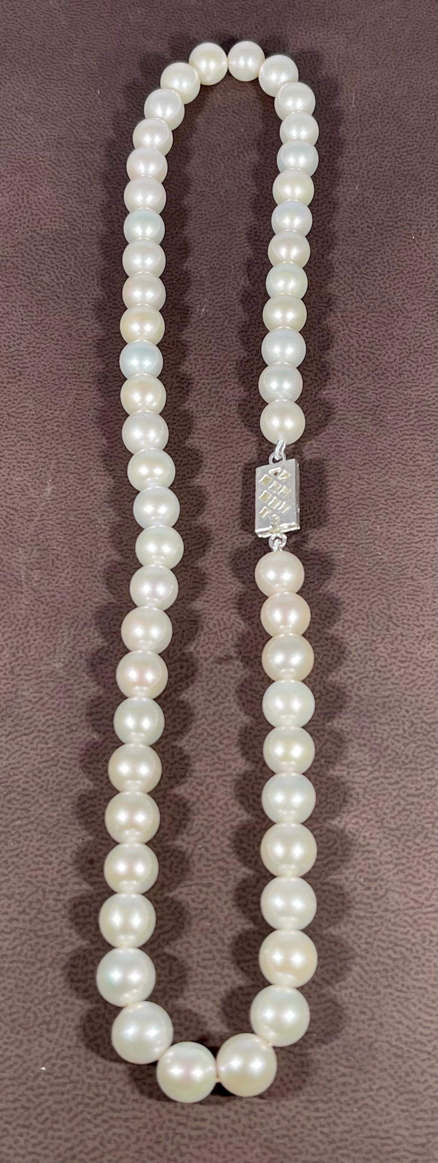 51 Round White Fresh Water  Pearls Strand Necklace Set in Silver Clasp In Excellent Condition For Sale In New York, NY