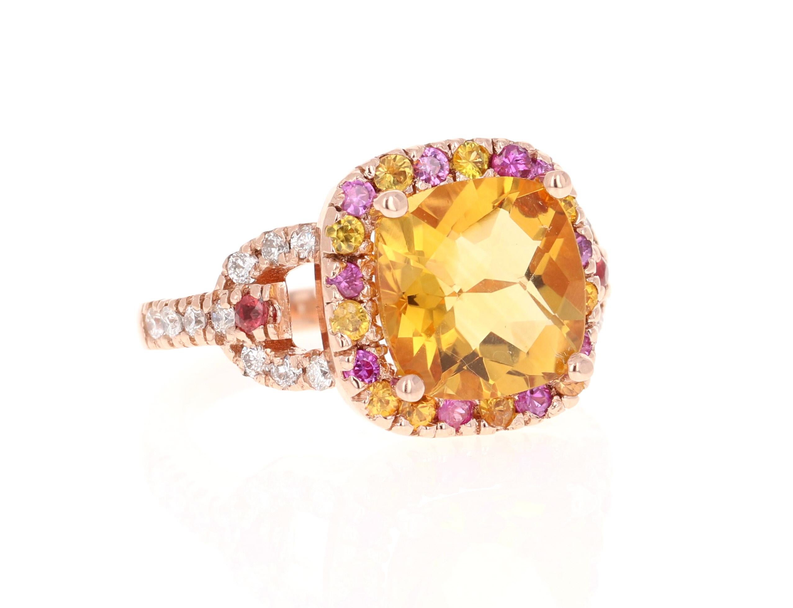 A Stunning and Unique piece to say the least! 

This magnificent ring has a bold Cushion Cut Citrine that is blazing yellow! It weighs 4.05 carats and is surrounded by a beautiful row of alternating Diamonds and Pink Sapphires. There are 22 Round