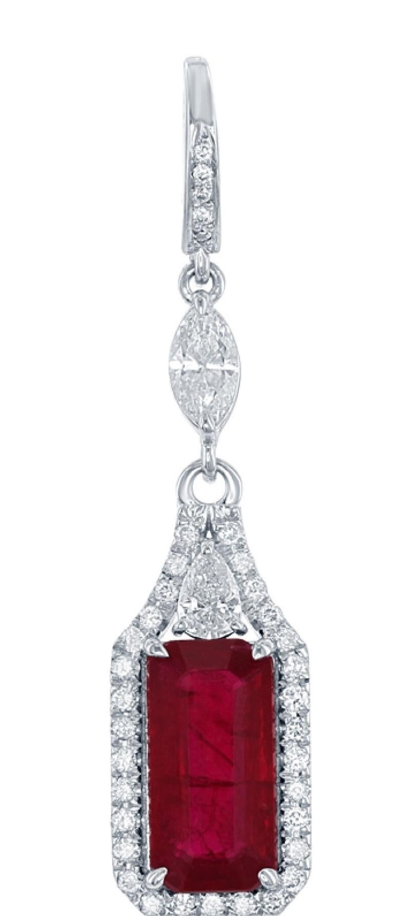 Red is a the color of love and you'll be sure to fancy these lovely ruby and diamond drop earrings. With two perfectly matched, rich red emerald cut rubies totaling 5.10ct these can not be missed. There are four pear brilliant shape diamonds between