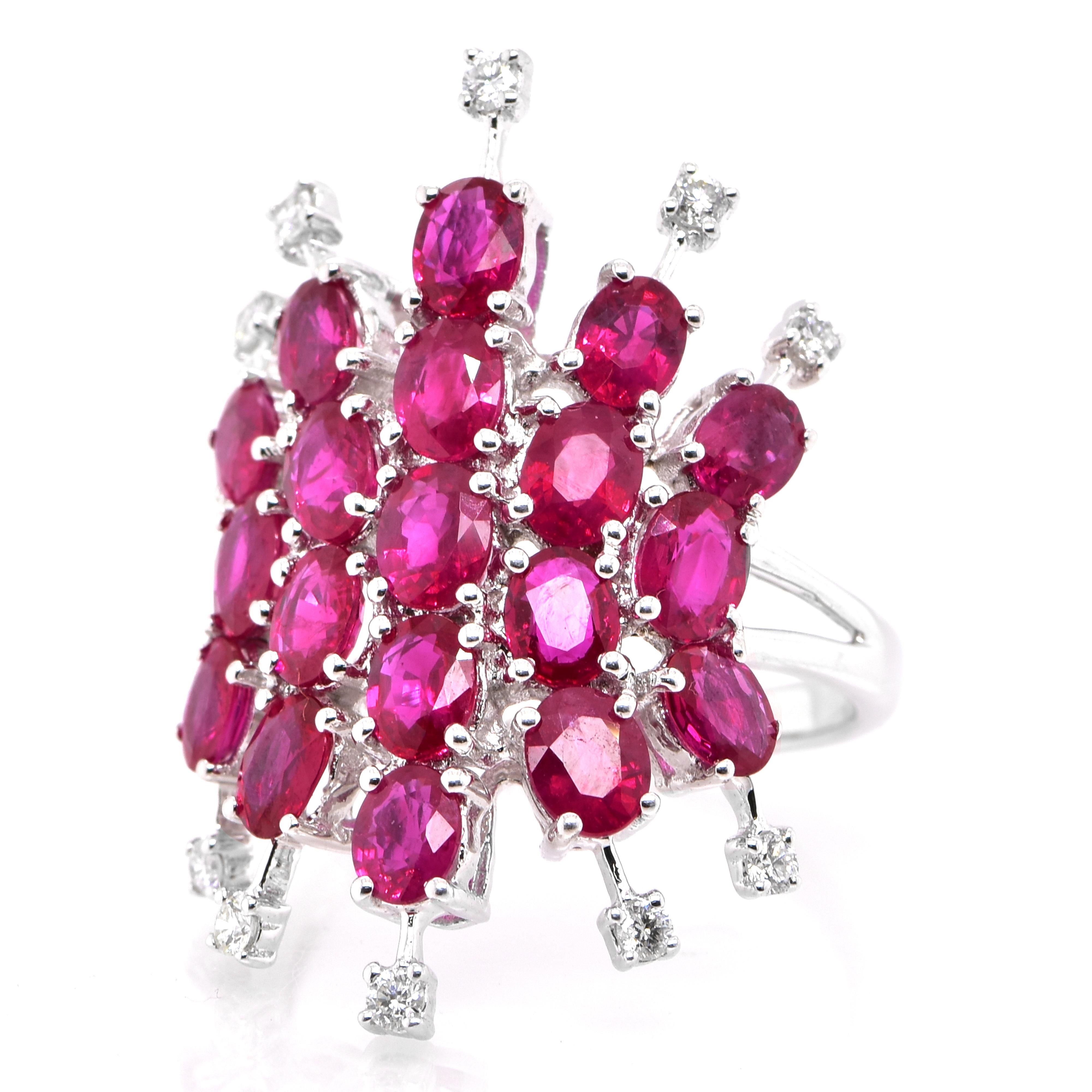 A beautiful Ring set in 18 Karat White Gold featuring 5.10 Carats of Calibrated Ruby and 0.23 Carat Diamonds. Rubies are referred to as 