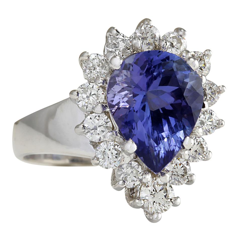 Introducing our stunning 5.10 Carat Natural Tanzanite 14 Karat White Gold Diamond Ring, a true masterpiece of elegance and sophistication. Crafted from luxurious 14K white gold, this exquisite ring is stamped for authenticity and quality assurance.