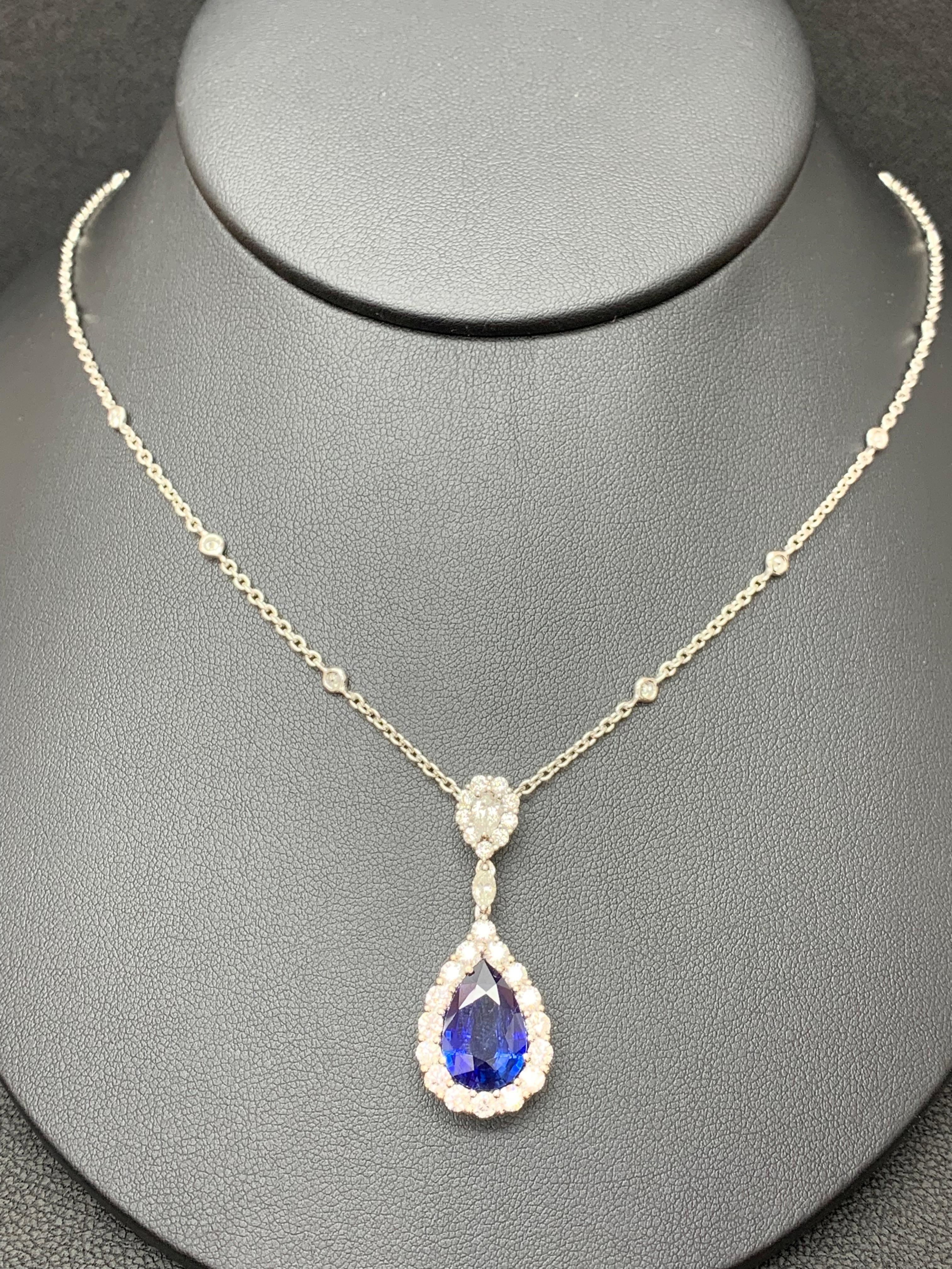 5.10 Carat Pear Shape Blue Saphire and Diamond Halo Drop Pendant Necklace For Sale 4
