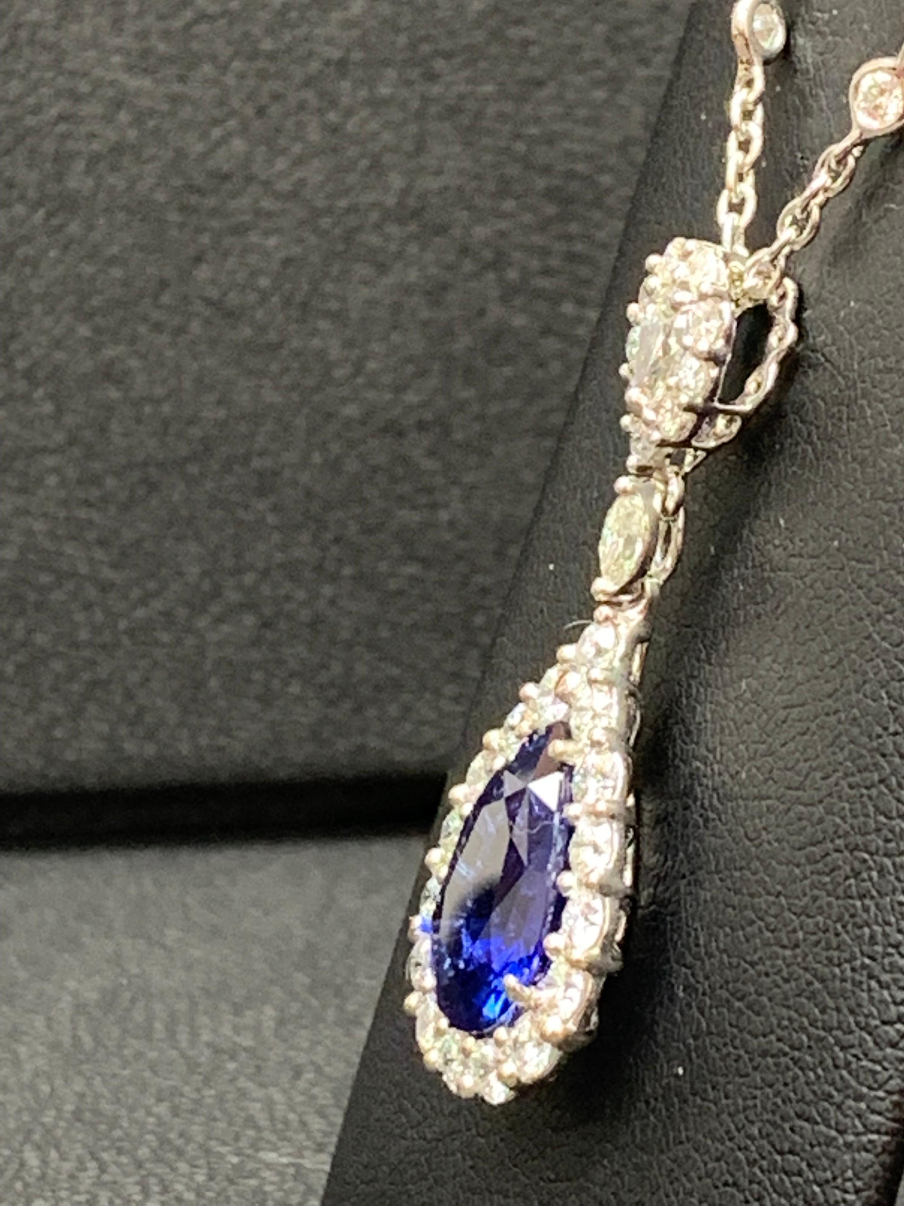 Modern 5.10 Carat Pear Shape Blue Saphire and Diamond Halo Drop Pendant Necklace For Sale